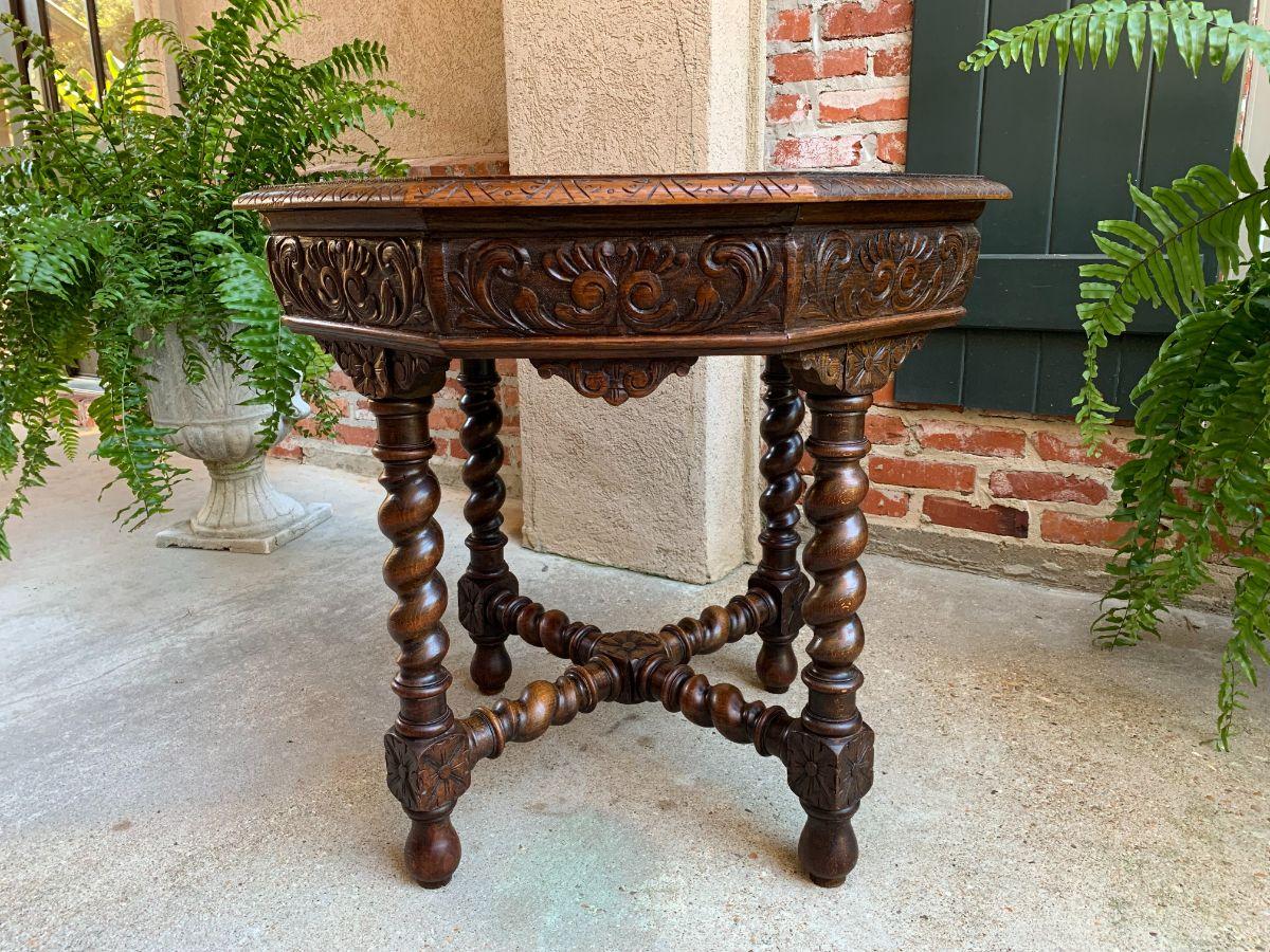 Antique French Octagon center side table carved oak Barley Twist Renaissance Design.

Direct from France, and ornately carved antique French “octagonal” table with impressive silhouette and commanding design!  This style table was originally used