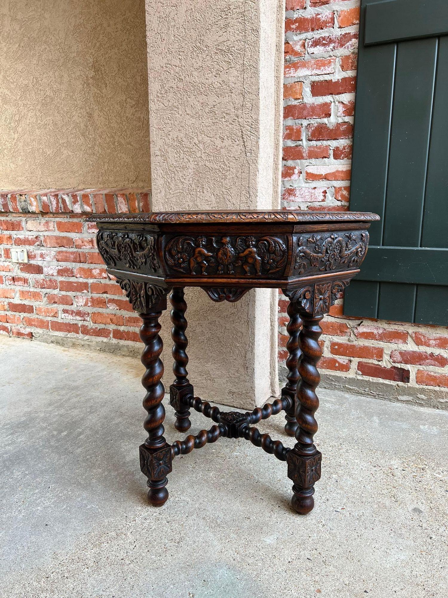 Antique French Octagon sofa table carved oak Barley Twist Louis XIII Renaissance.

Direct from France, a fabulous antique French octagon table, with impressive details, including barley twist legs and barley twist cross stretchers. This style