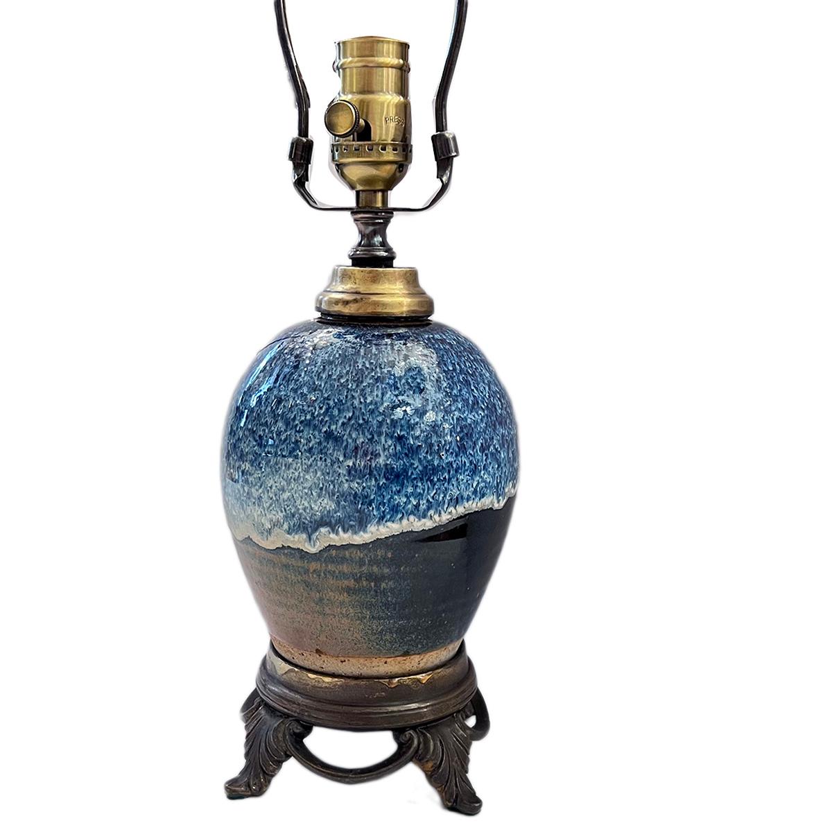 A circa 1920s French porcelain oil lamp converted to electric.

Measurements:
Height of body: 9.5