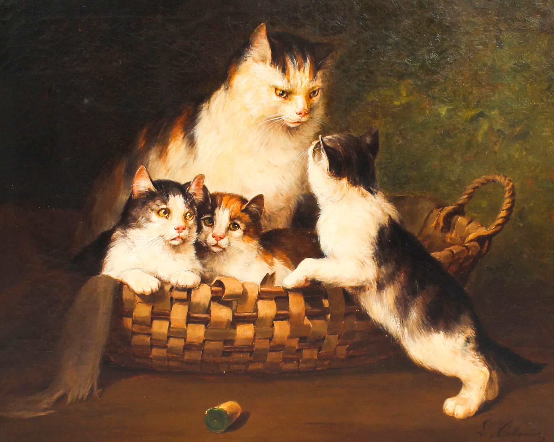This is a charming large antique oil on canvas painting of a domestic scene featuring kittens with their mother, signed L. Cabaniez on the lower right.

It features an interior scene with a vibrantly painted tabby mother cat seated in a basket