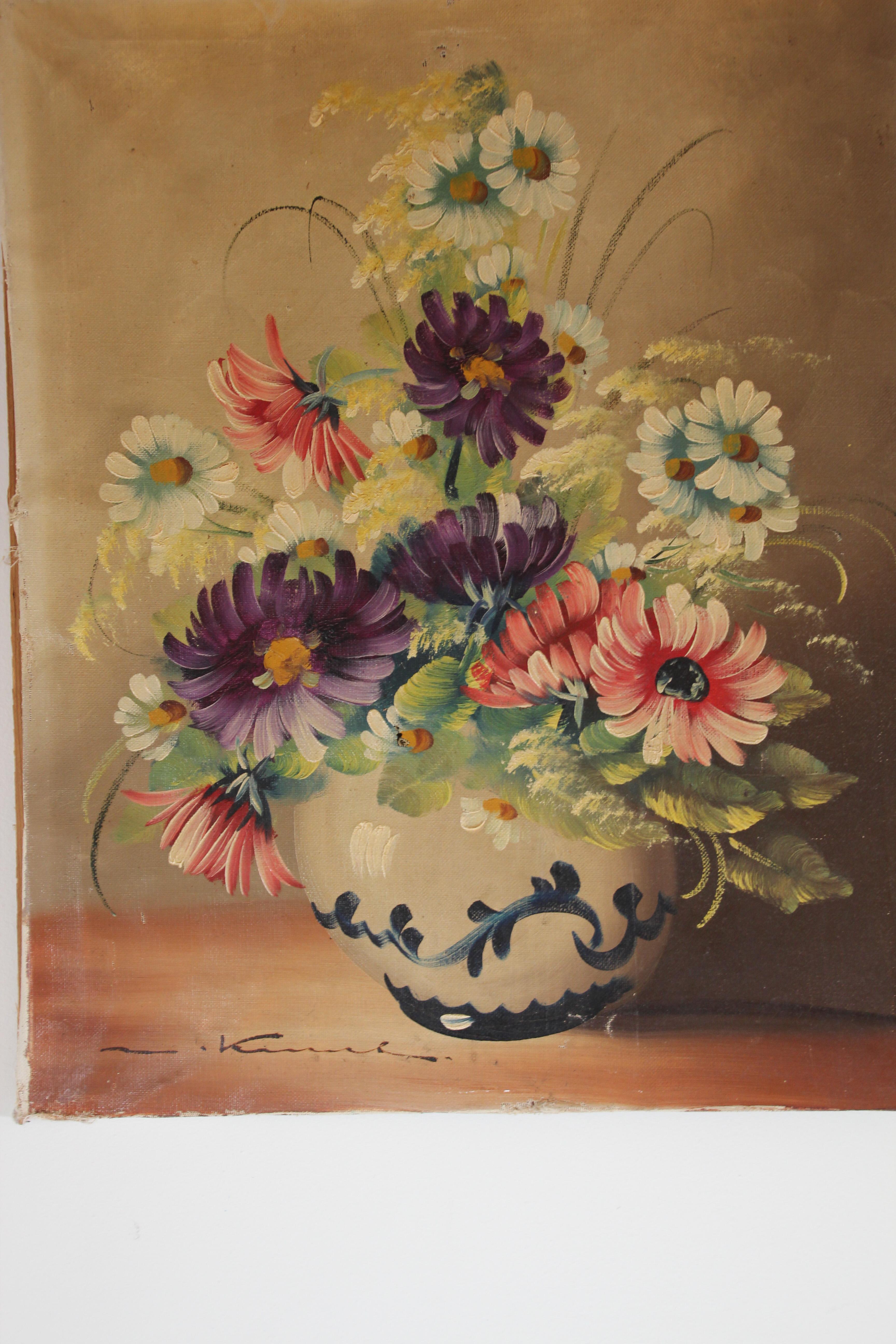 Early to mid 20th century French oil painting on canvas of flowers in a vase. 
Really beautifully painted early 20th century still life signed by artist.
Not framed just stretched canvas.