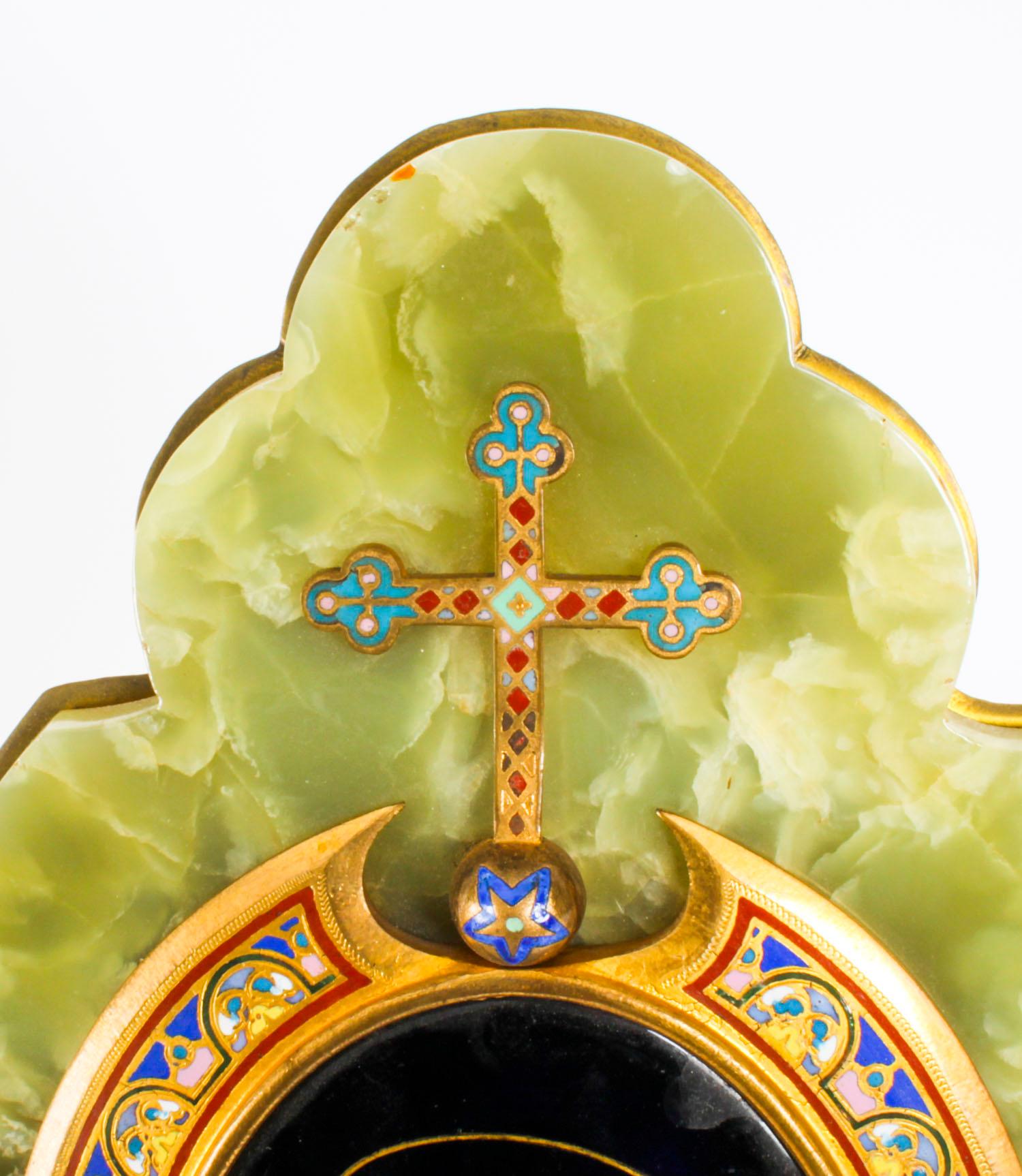 This is a beautiful large champleve enamel and ormolu decorated onyx wall hanging holy water stoop, late 19th century in date.

The shaped onyx is mounted on an ormolu base, the champleve enamel is decorated in royal blue, pink and red and is