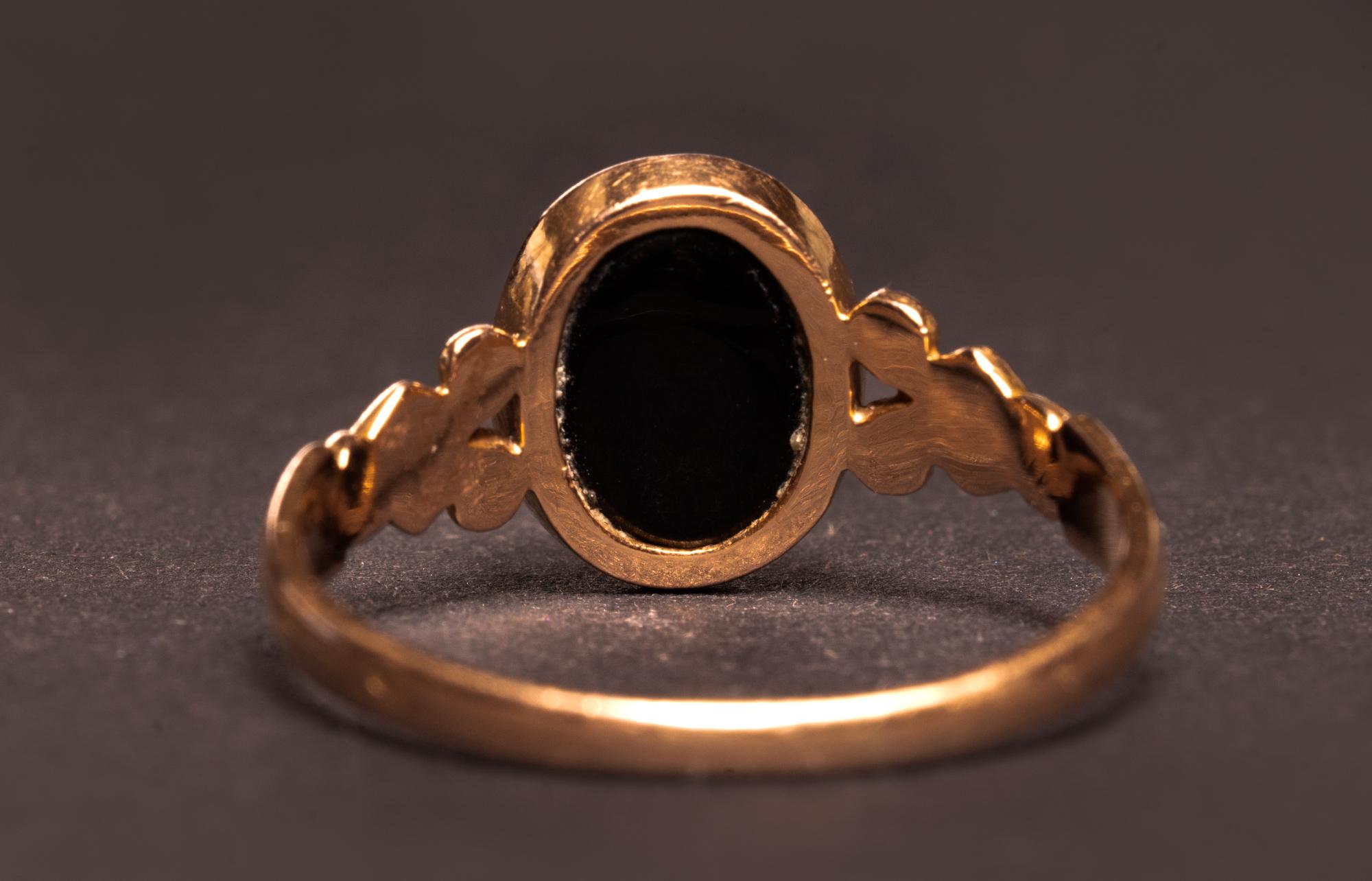 antique black onyx ring with diamond