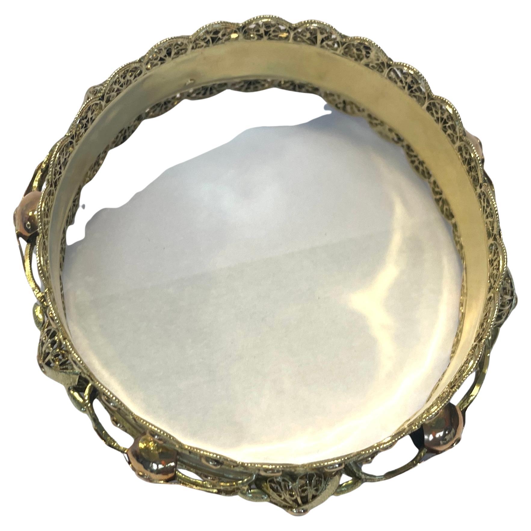 Antique Victorian 2 tone Rose Gold French Oriental Bangle Bracelet 18 Karat.
An exceptional example of antique fine Victorian Colonial style jewellery well done in Oriental design. 
The piece has a circumference of just over 8 inches. 
It is just