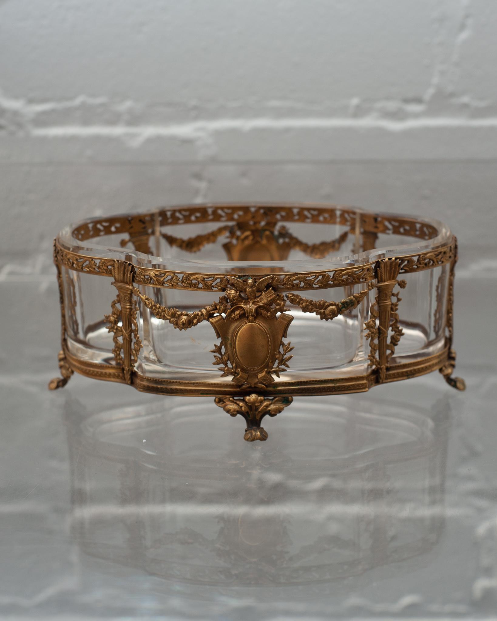A beautiful small antique French ormolu and crystal jardiniere. Finely detailed, this piece transitions from classical to modern interiors.