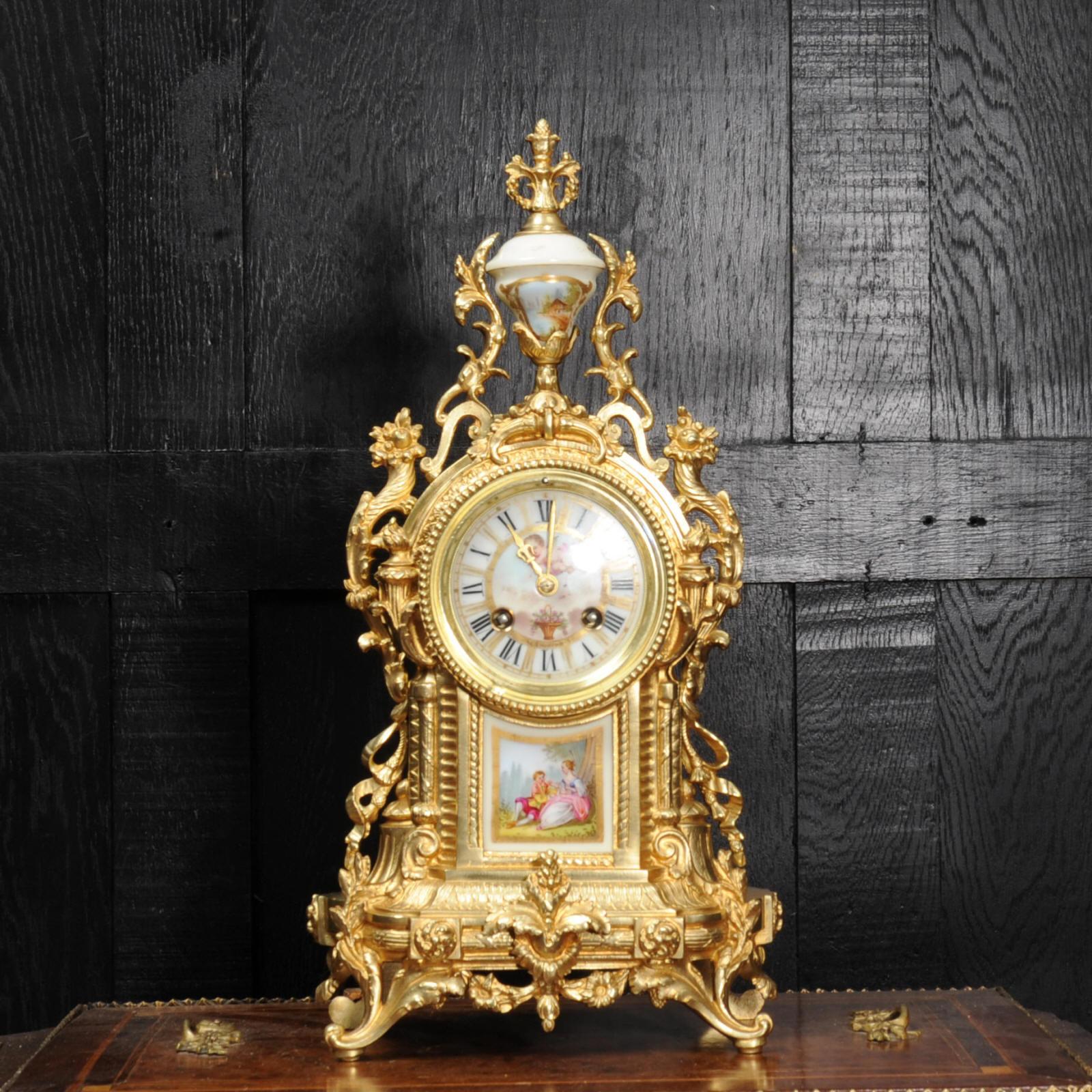 A beautiful antique French ormolu (gilt bronze) clock with exquisitely decorated Sèvres style porcelain panel, urn and dial. The movement is by the distinguished clockmaker Samuel Marti and dates from circa 1870. The style is Louis XVI, decorated