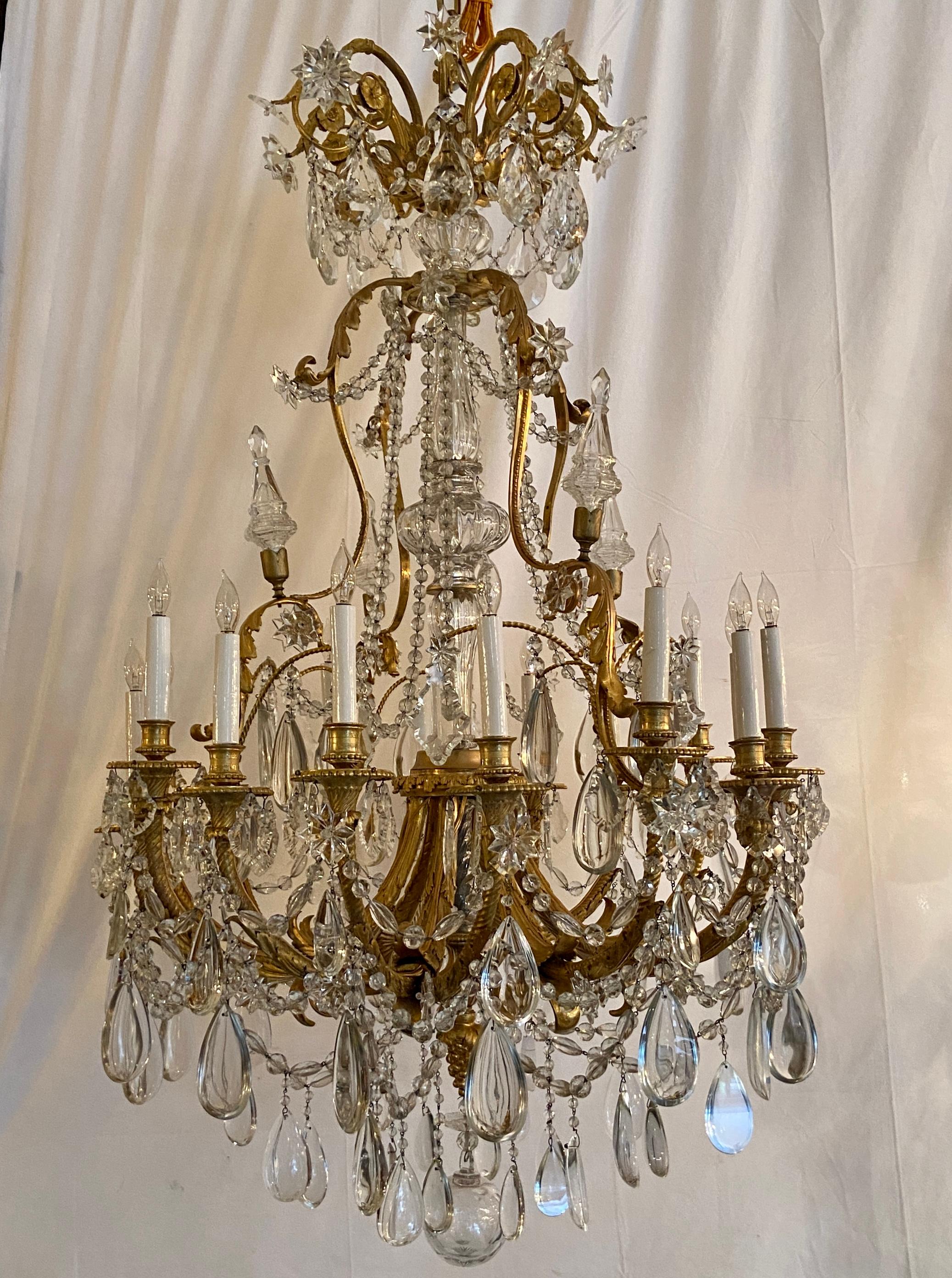Antique French Exceptional Ormolu bronze chandelier with Baccarat crystal polished prisms, Circa 1860.