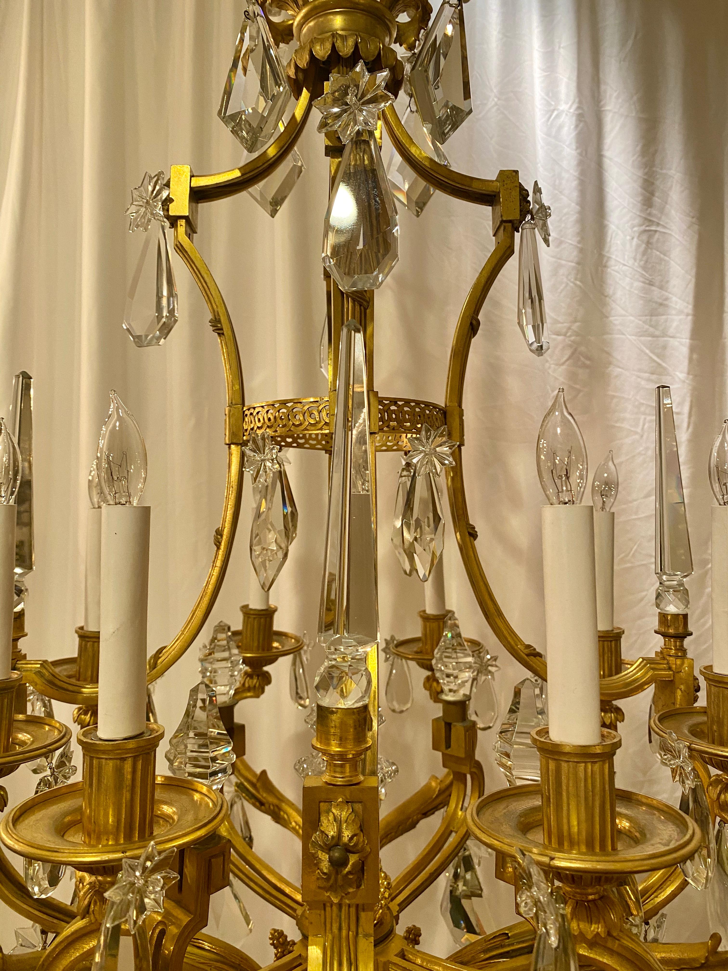 Antique French Ormolu Bronze and Cut Crystal Chandelier, Circa 1860-1870.
We love this chandelier with its fine ormolu and handsome appearance. Of medium size, it would work well in a variety of settings.