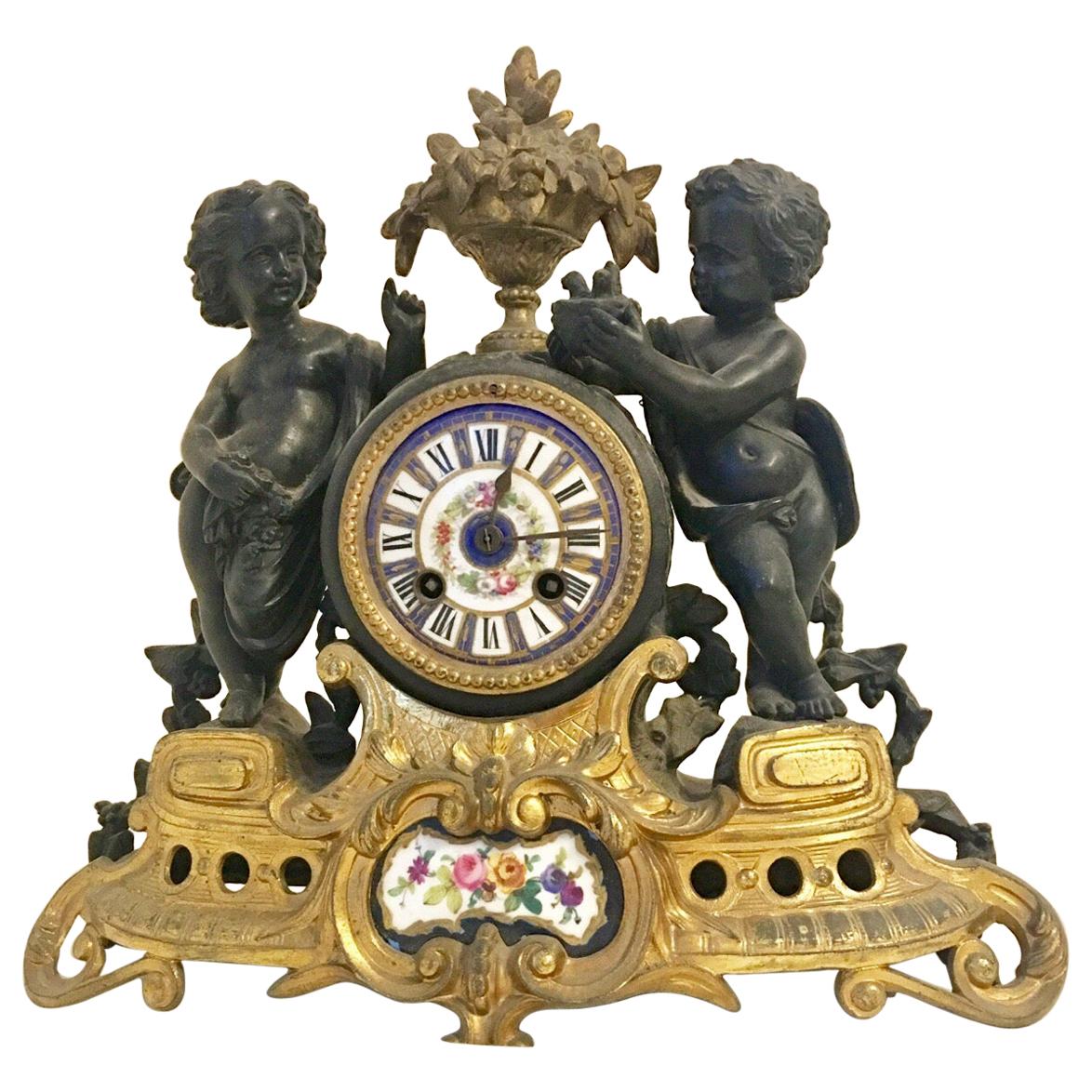 Antique French Ormolu Cherub Striking Mantel Clock For Sale