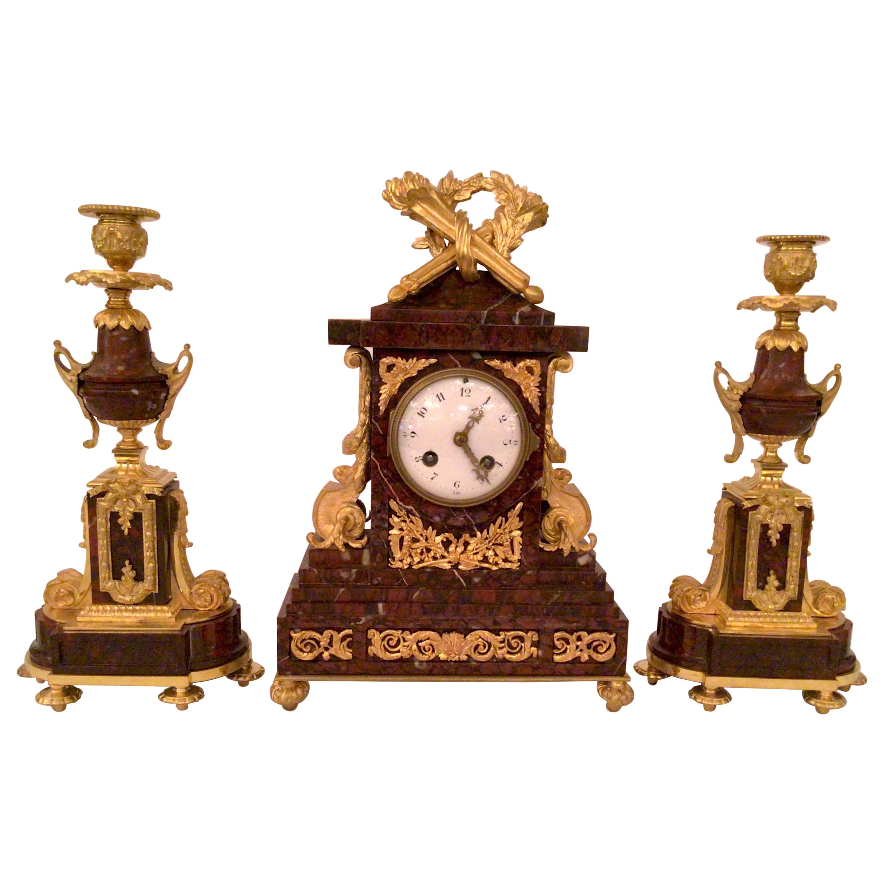 Antique French Ormolu Clock and Candlesticks Set with Rouge Marble, Circa 1880's For Sale