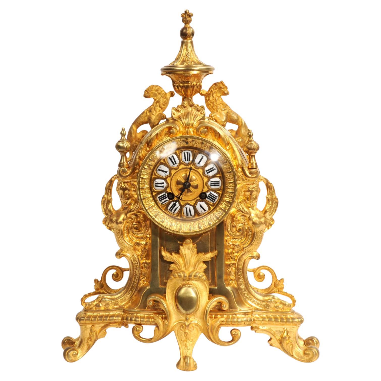 Horloge française ancienne en bronze doré - Lions Rampant - surhaussée et testée