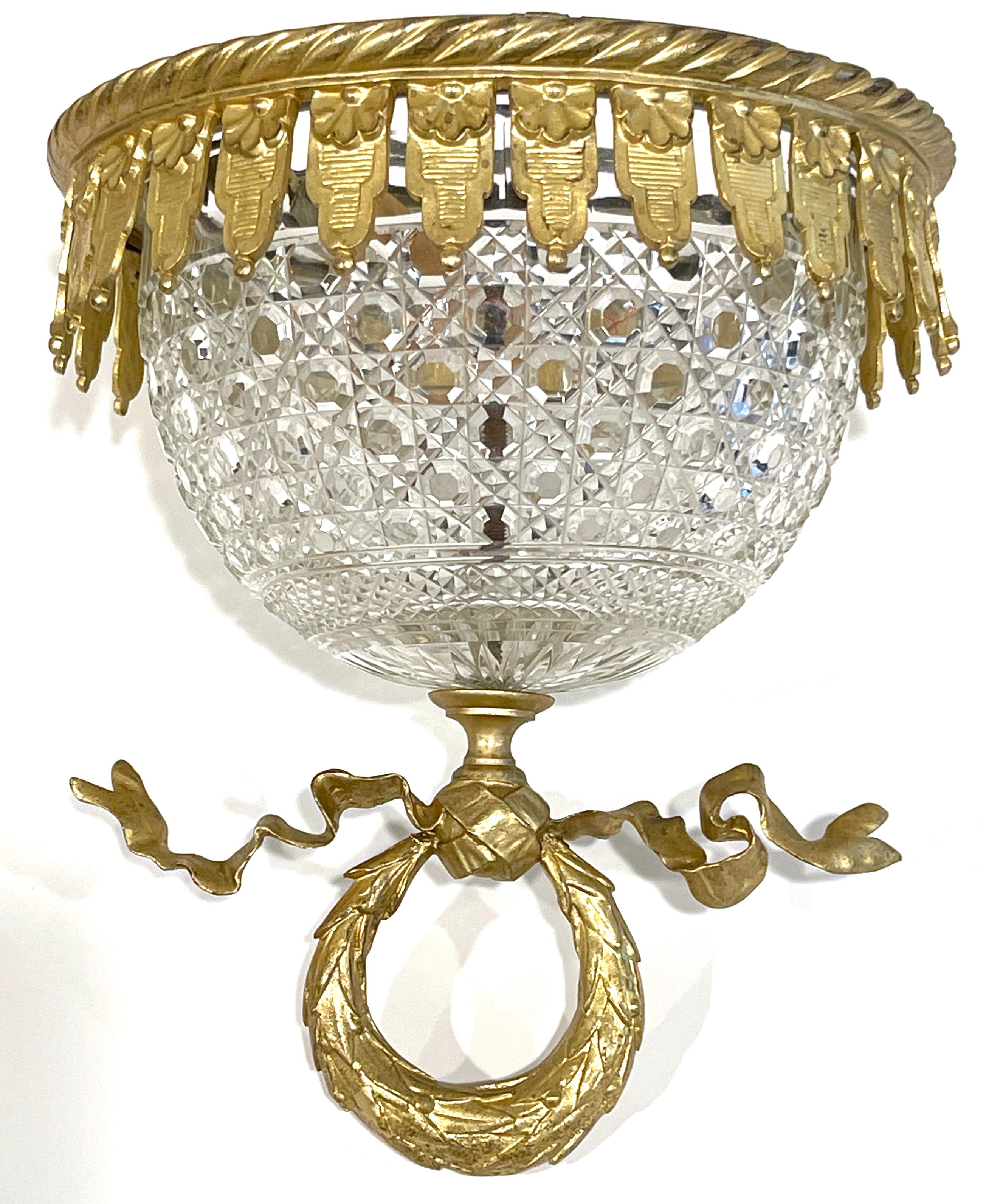 Antique French Ormolu mounted Baccarat ( atrib.) crystal flush mount chandelier.
France, circa 1900s
Attributed to Baccarat 

An impressive, diminutive work, which displays the superior craftsmanship and design of the Baccarat crystal works.
