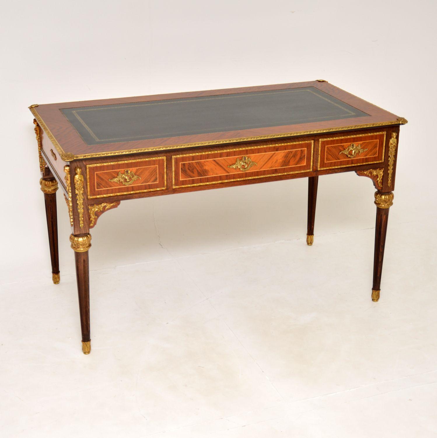 A stunning and very impressive antique French Louis XV style desk, which I would date from around the 1930-50’s period.

The quality is superb, this is very well made with lots of intricate details. There are fine quality gilt bronze ormolou