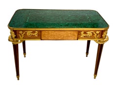 A Louis XVI Style Ormolu-Mounted Malachite and Marquetry Table by Henry Dasson