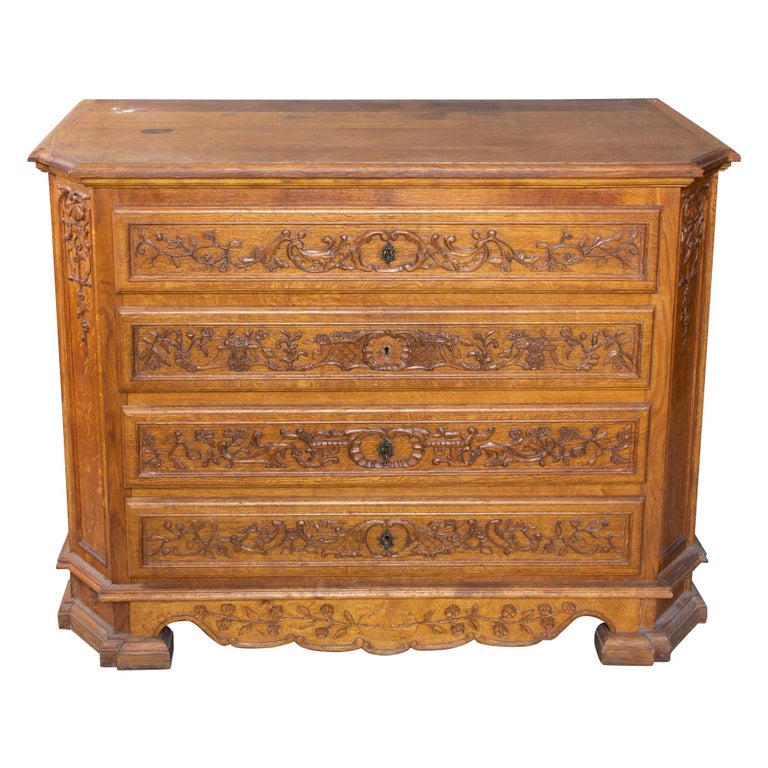 Antique French Ornate Four Drawer Commode With Key Pulls For Sale