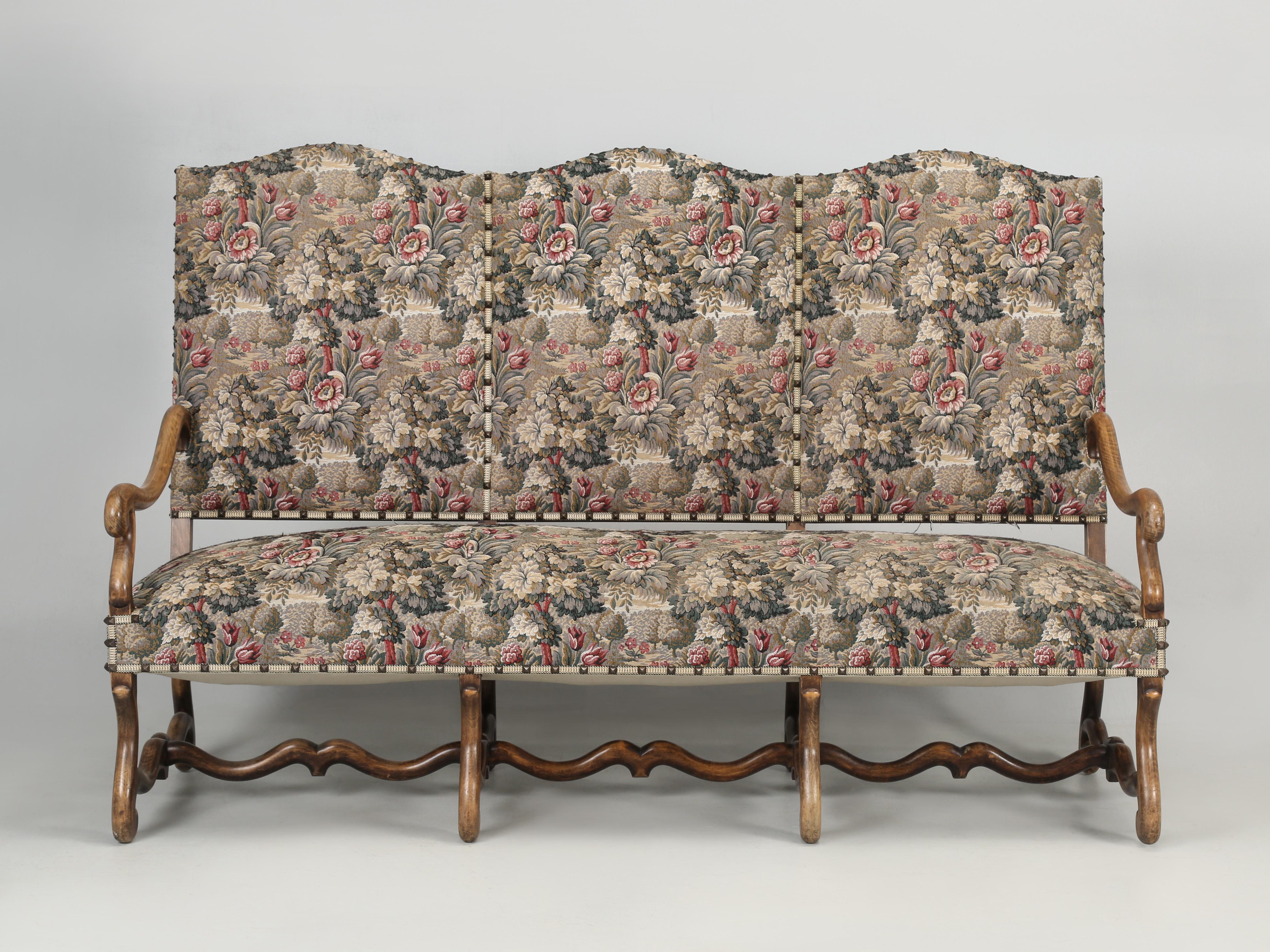 Vintage French Os de Mouton (French for sheep's bone) referring to the shape of the lower frame of this settee. The style of Os de mouton has been popular since the time of Louis XIV and are still being made today throughout the world. This vintage