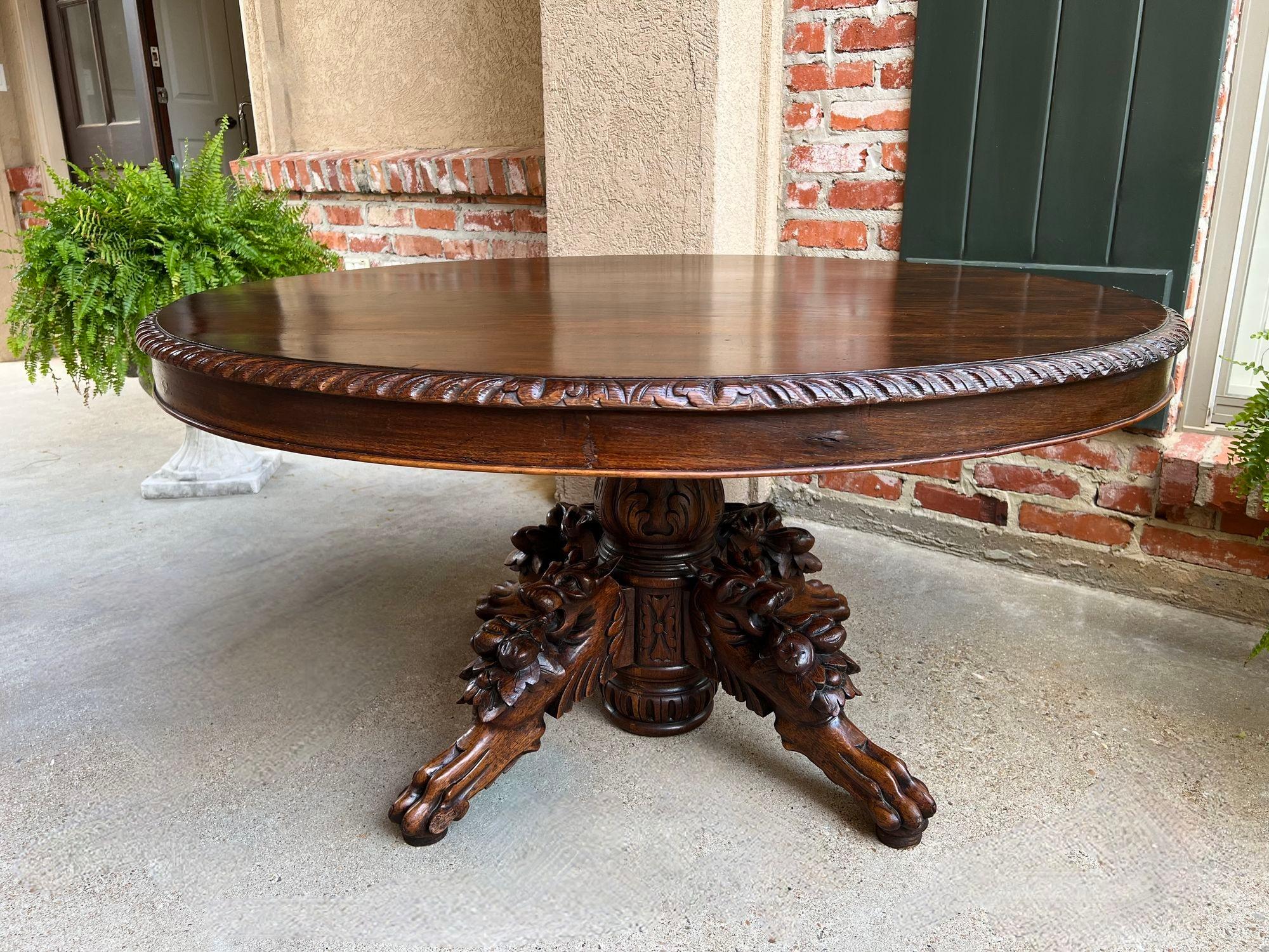 Hand-Carved Antique French Oval Center Hunt Table Carved Black Forest Pedestal Coffee Table