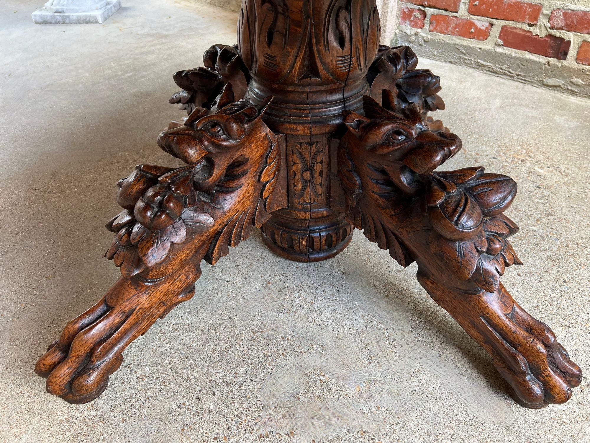 19th Century Antique French Oval Center Hunt Table Carved Black Forest Pedestal Coffee Table