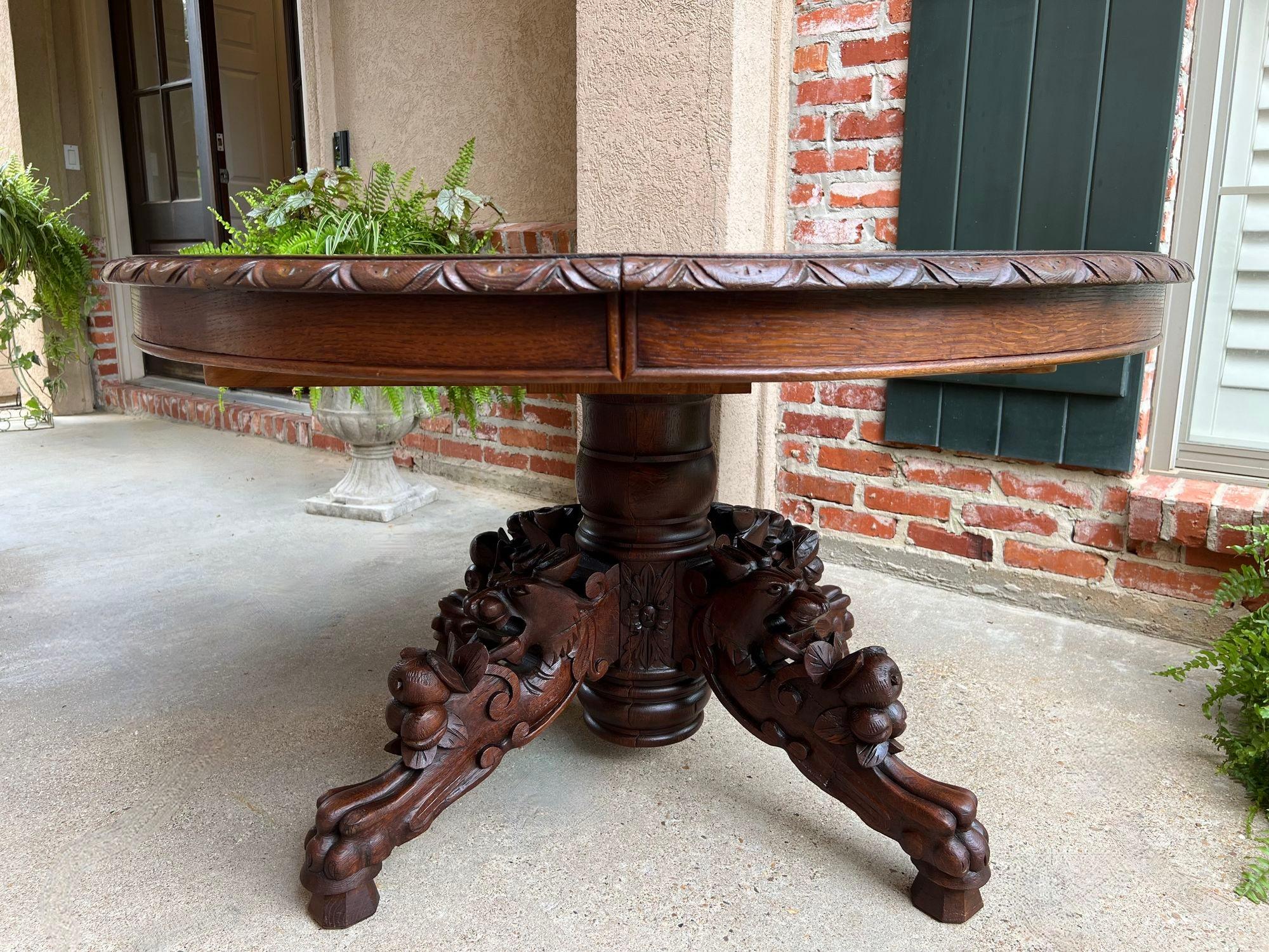 Hand-Carved Antique French Oval Dining Table Carved Oak Black Forest Sofa Library Griffin