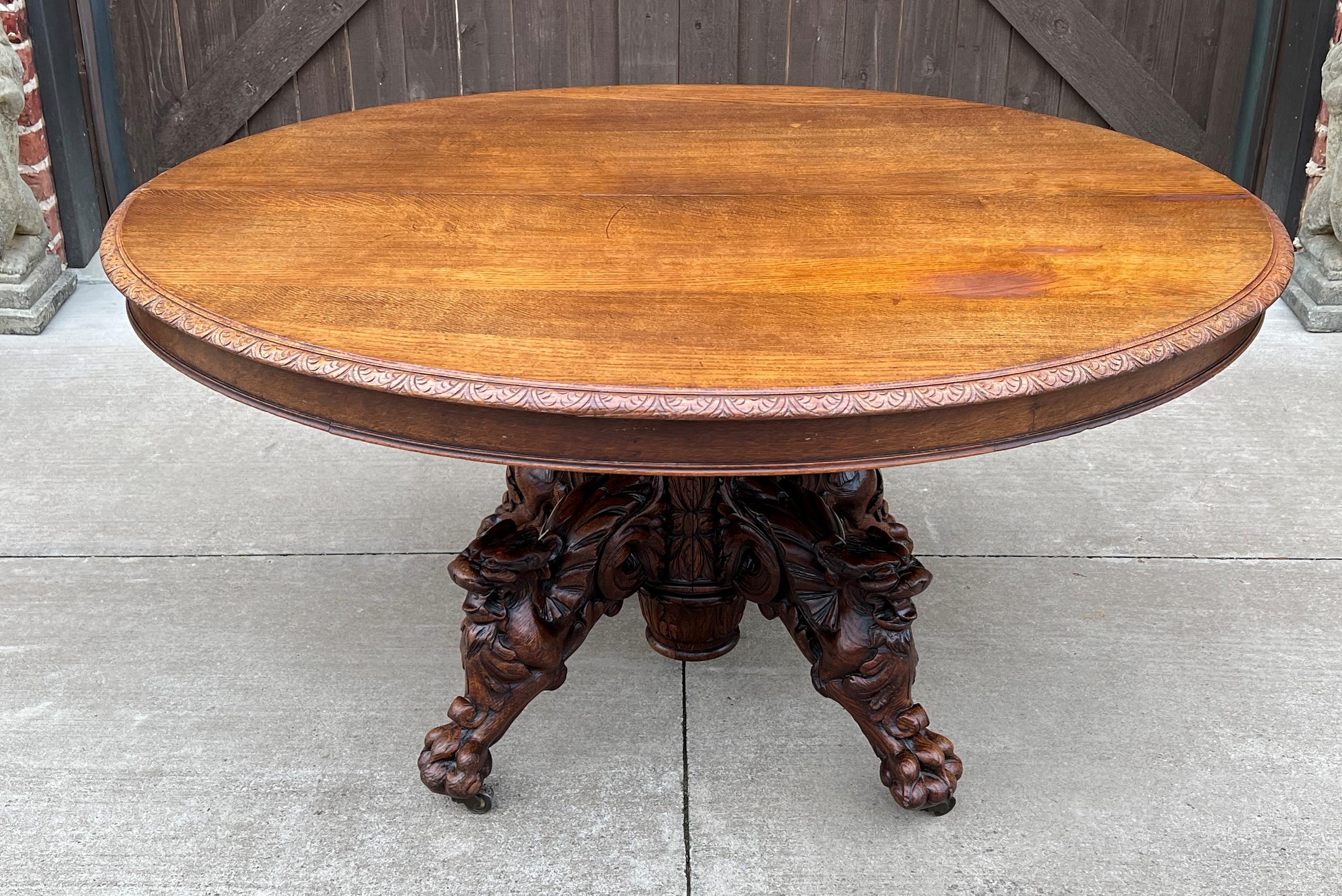 Carved Antique French Oval Game Dining Table Pedestal Black Forest Hunt Honey Oak, 19thC For Sale