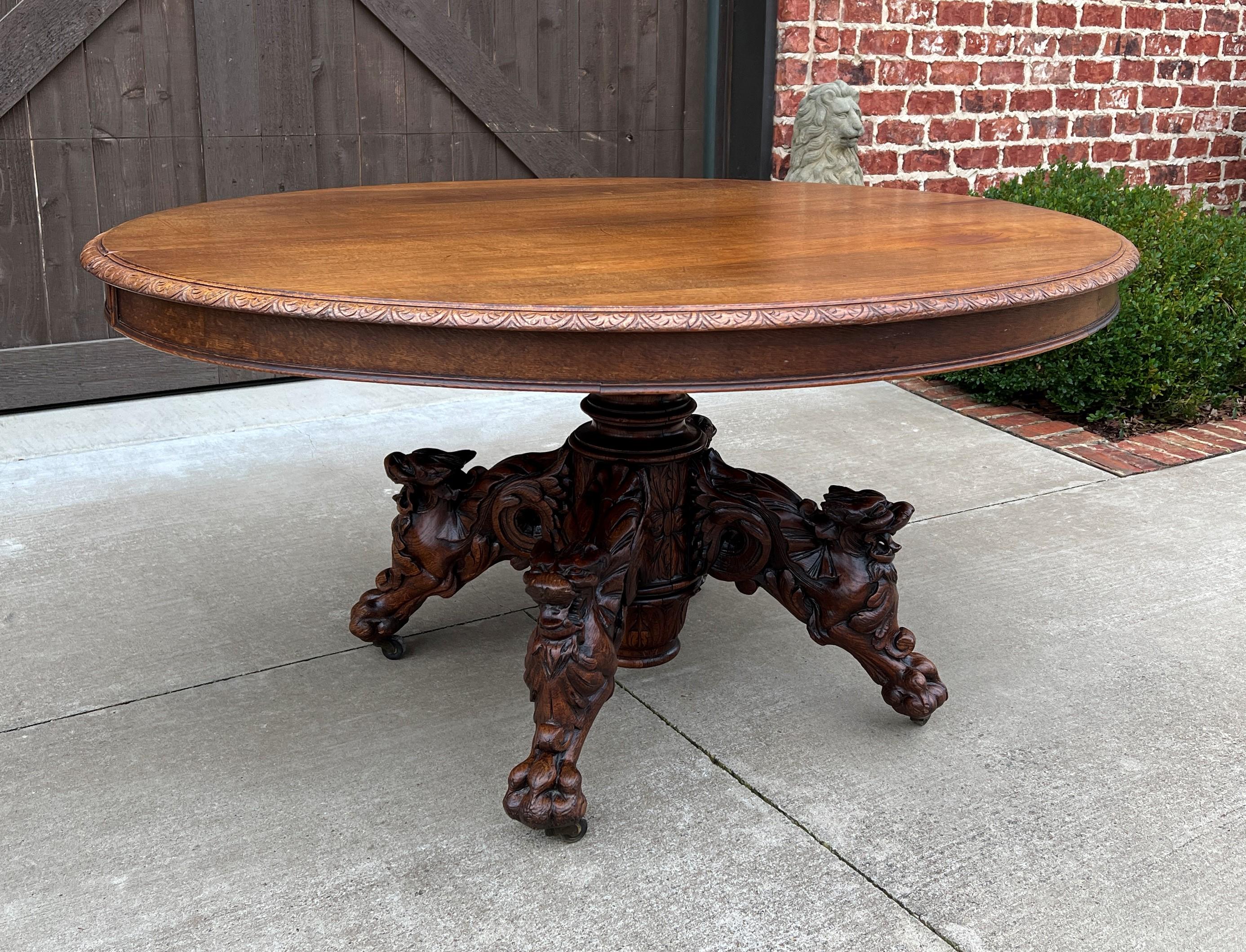 Antique French Oval Game Dining Table Pedestal Black Forest Hunt Honey Oak, 19thC In Good Condition For Sale In Tyler, TX