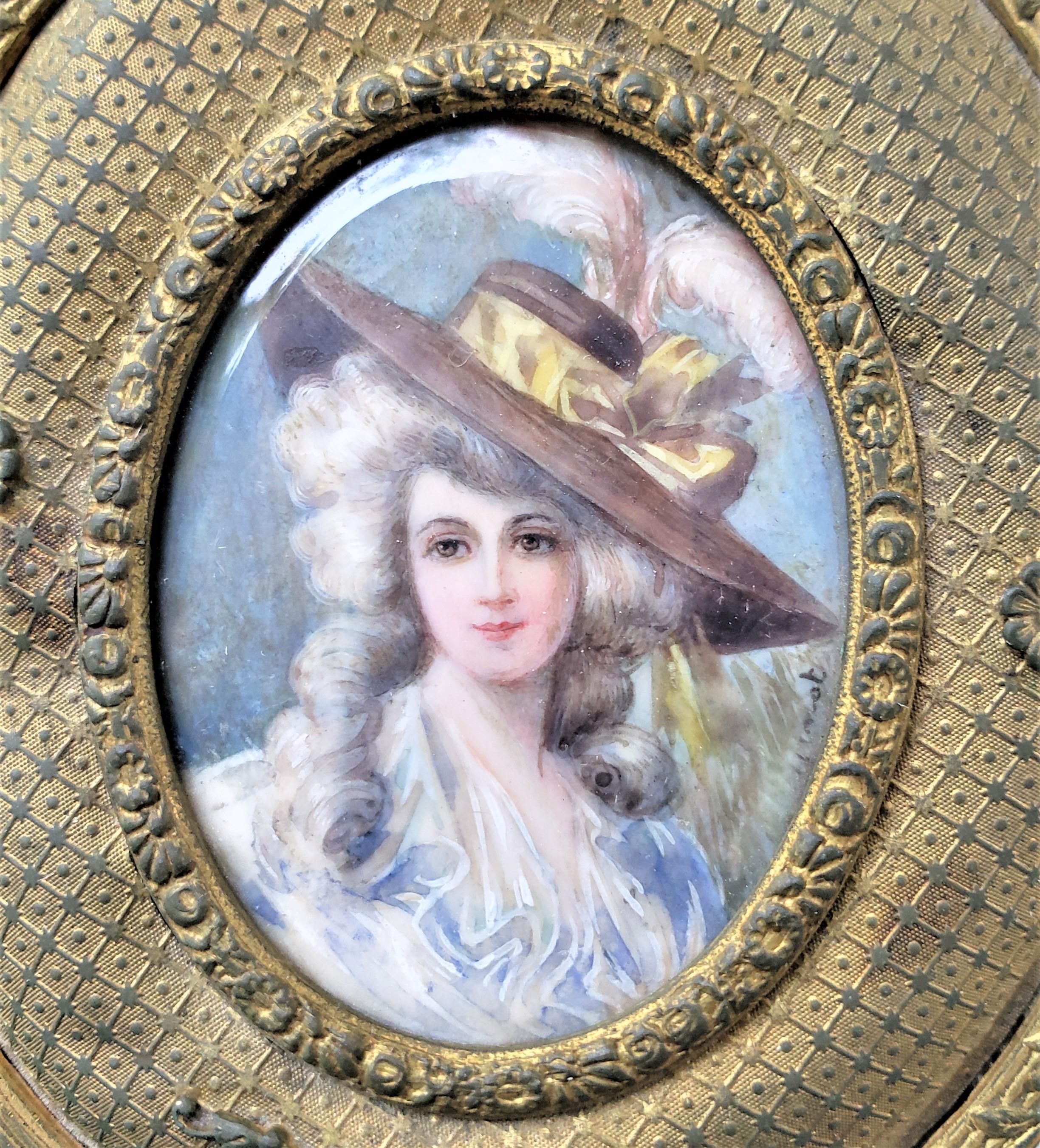 Renaissance Revival Antique French Oval Gilt Finished Metal Box with Signed Hand-Painted Portrait For Sale