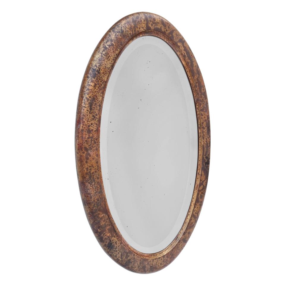 Antique French mirror from the 50's, rare oval frame in wood paint brown tones marbled patinated on a gilded to the leaf background. Antique frame width: 5 cm / 1.96 in. Antique bevelled glass mirror. Wood back.
