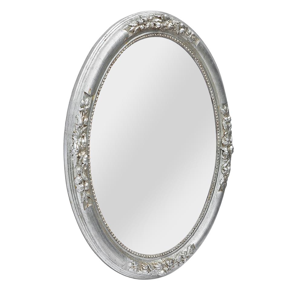 Antique French oval mirror in patinated silvered wood, circa 1900. Antique frame with floral and pearl decoration around the glass mirror. Re-gilding with leaf. Frame width: 5.5 cm / 2.16 in. Modern glass mirror. Wood back.