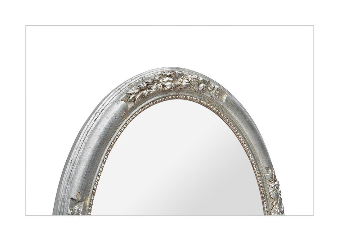 Mirror Antique French Oval Silverwood Wall mirror With Floral Decoration, circa 1900 For Sale