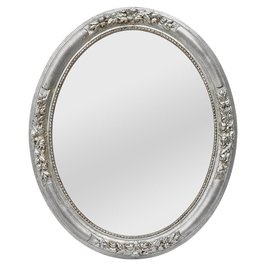 Antique French Specchio da parete ovale in legno d'argento con decorazioni floreali, circa 1900