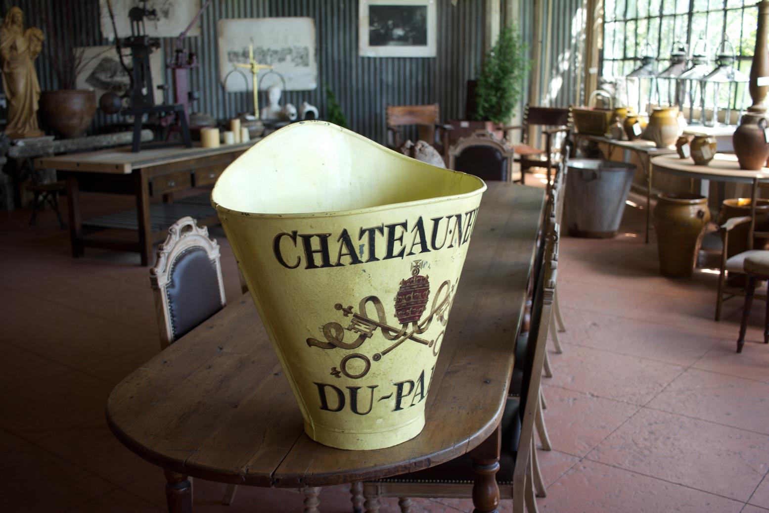 Early 20th century French zinc grape hotte/hod (used for picking grapes). Beautifully hand-painted with the famous Chateauneuf Du Pape coat of arms from the Provence Alpes Cote d'Azur region.

As it has a flat back, it can be filled with seasonal