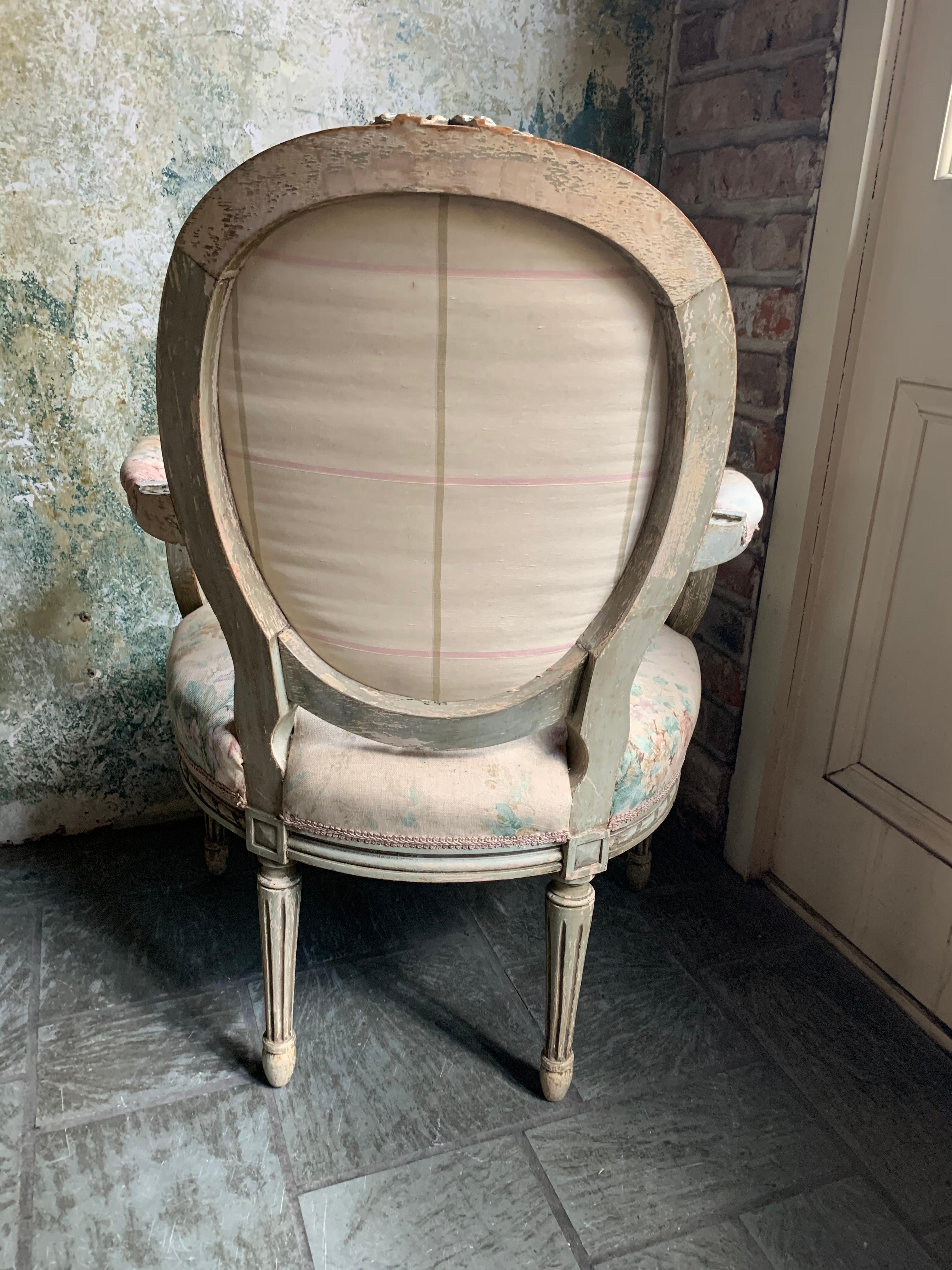 Antique French painted Louis XVI armchair.