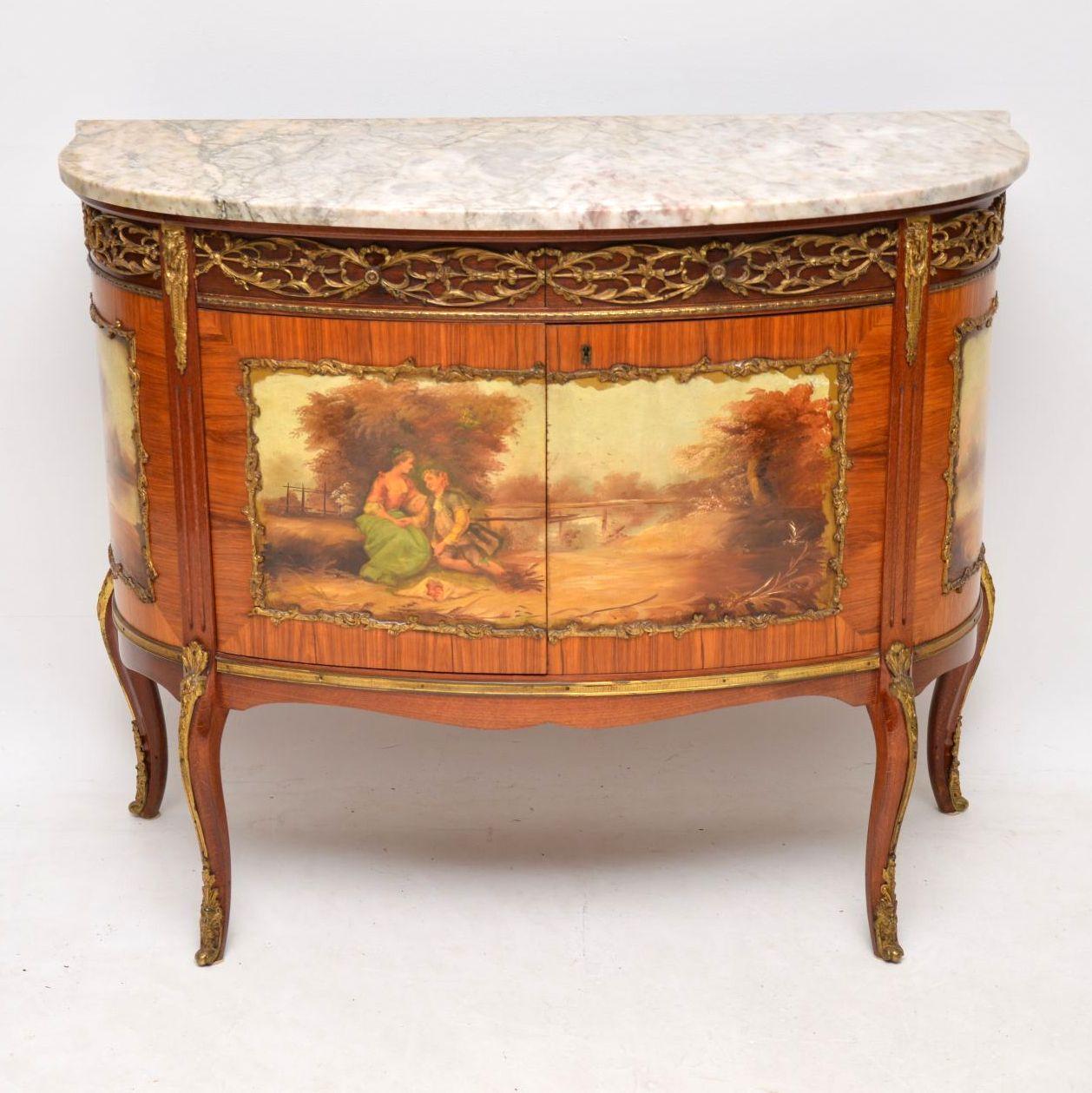 Very impressive antique French style marble-top cabinet with painted decoration and gilt bronze mounts. It’s all in excellent original condition including the marble and I would date this cabinet to around the 1920s-1930s period. There are two