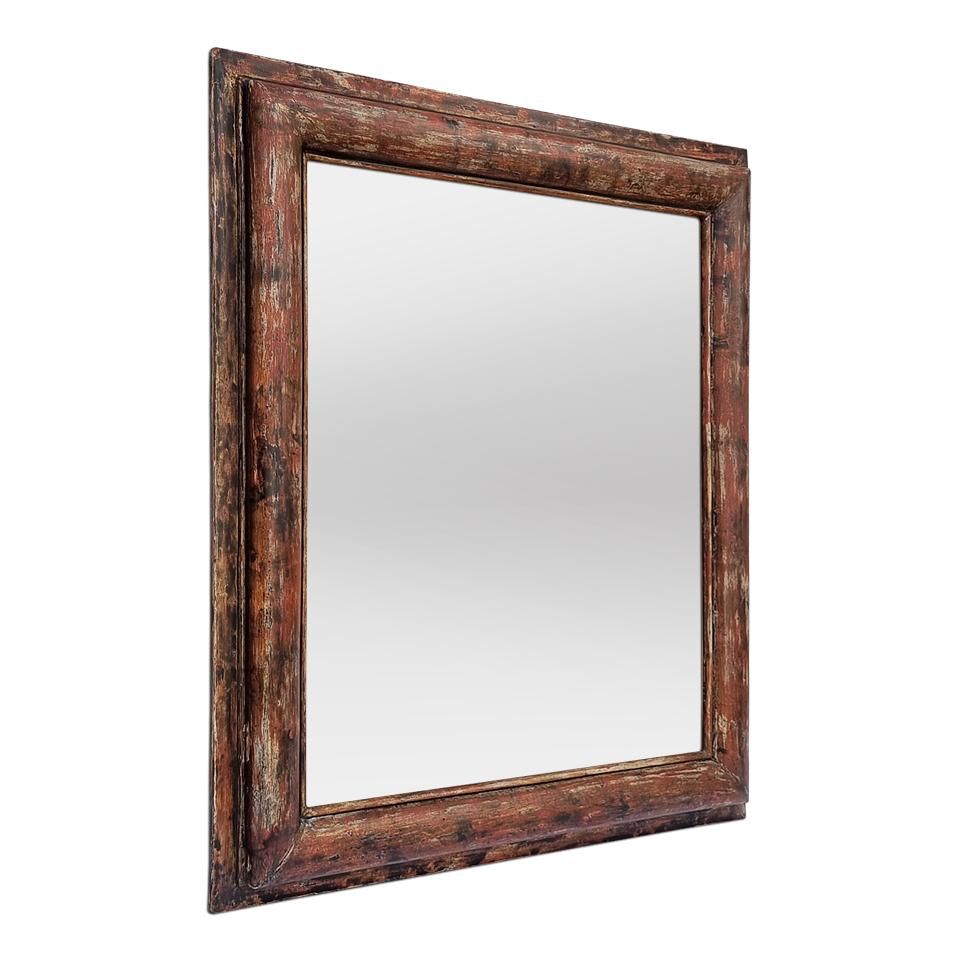 Rare antique French wall mirror in painted fir wood with ochre patina, circa 1950. Antique frame width:  6.5 cm / 2.55 in. Modern glass mirror. Wood back.