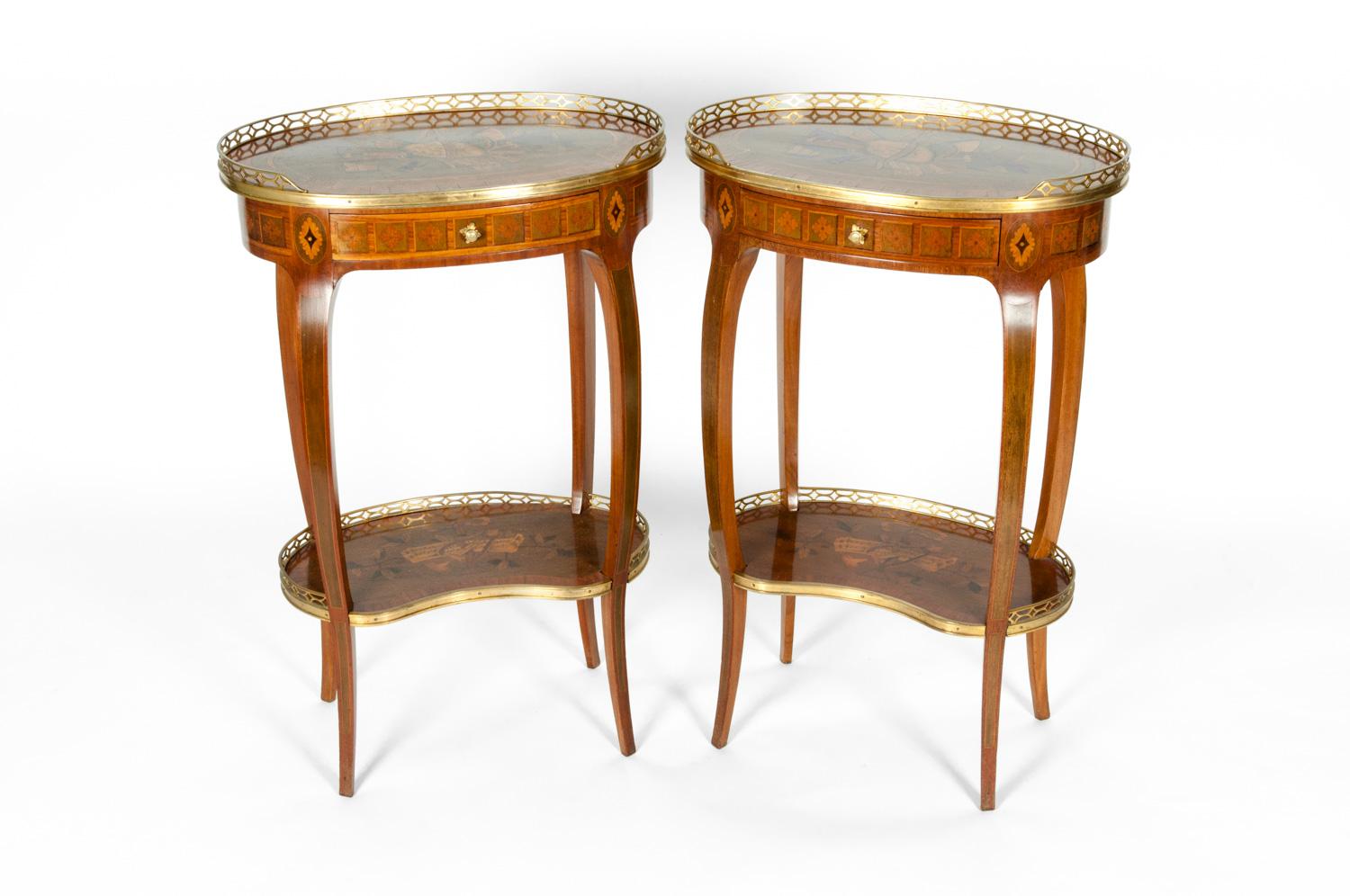 Antique French pair of Louis XV style mahogany Marquetery with gild bronze side / end tables. Each table is in excellent condition
and undersigned by the maker. Each one measure 28 inches high X 18 inches width X 12 inches deep.