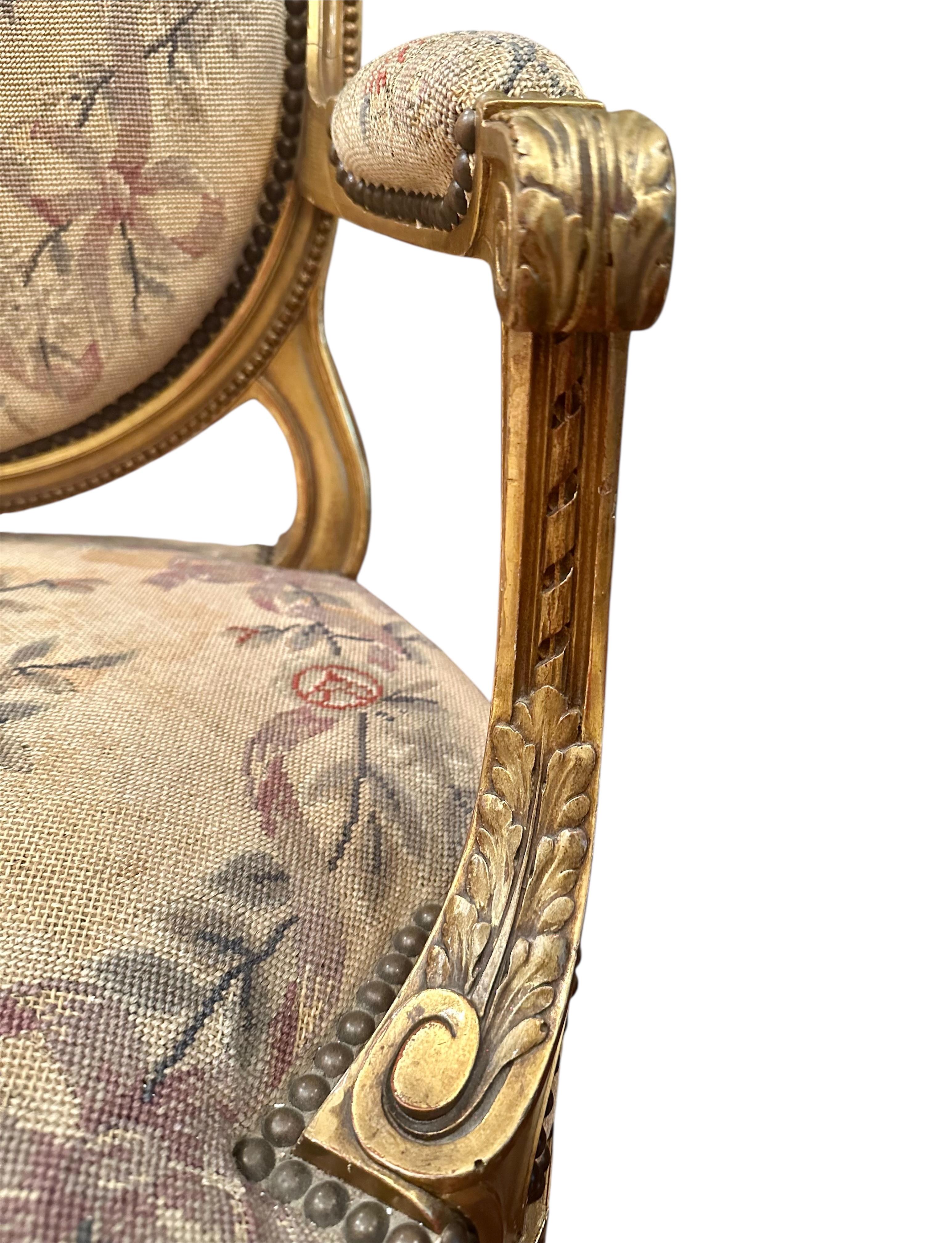Antique French Pair of Louis XVI Style Carved Giltwood Fauteuils For Sale 5