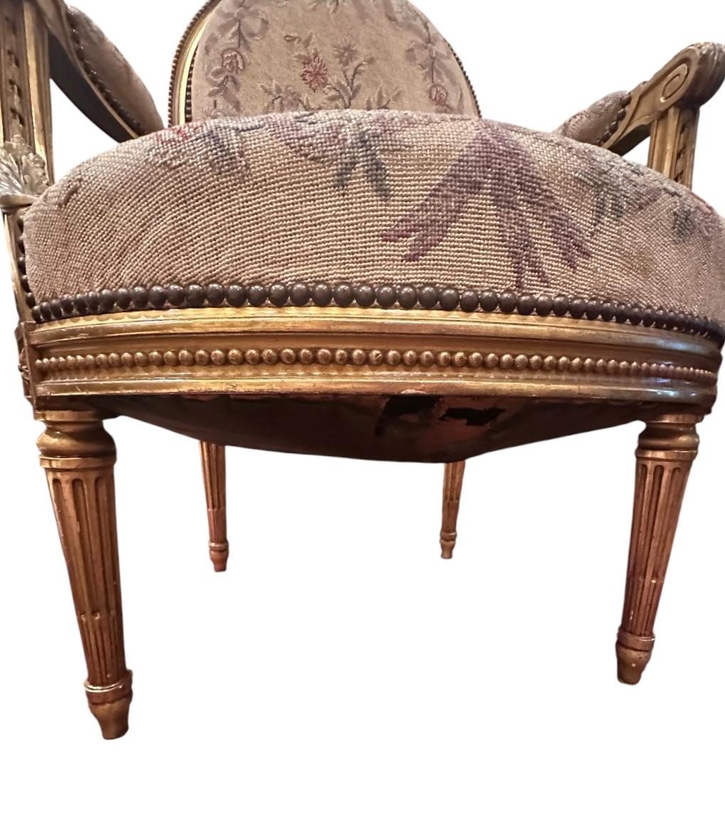 19th Century Antique French Pair of Louis XVI Style Carved Giltwood Fauteuils For Sale