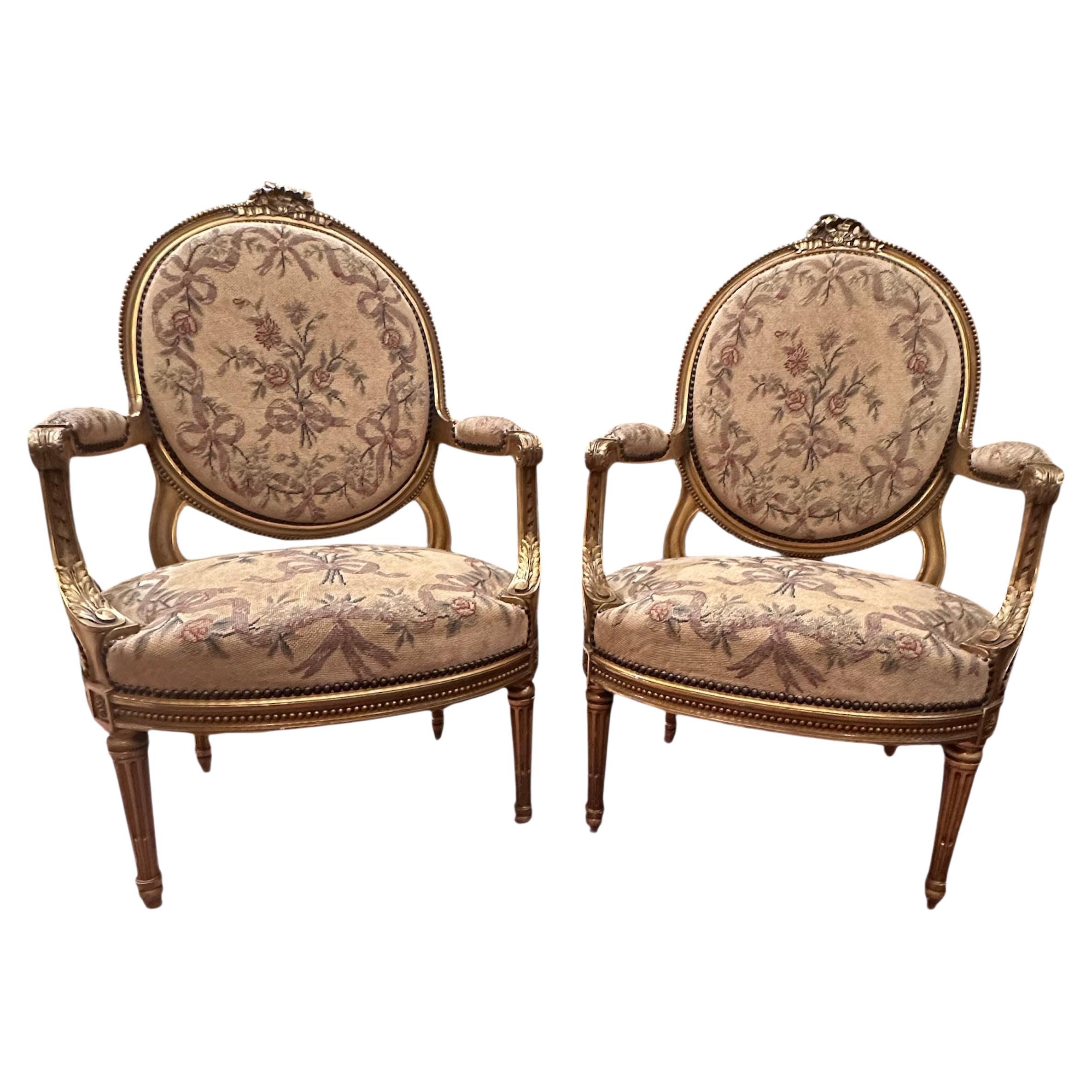 Antique French Pair of Louis XVI Style Carved Giltwood Fauteuils For Sale