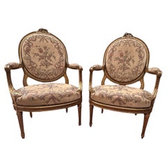 Antique French Pair of Louis XVI Style Carved Giltwood Fauteuils
