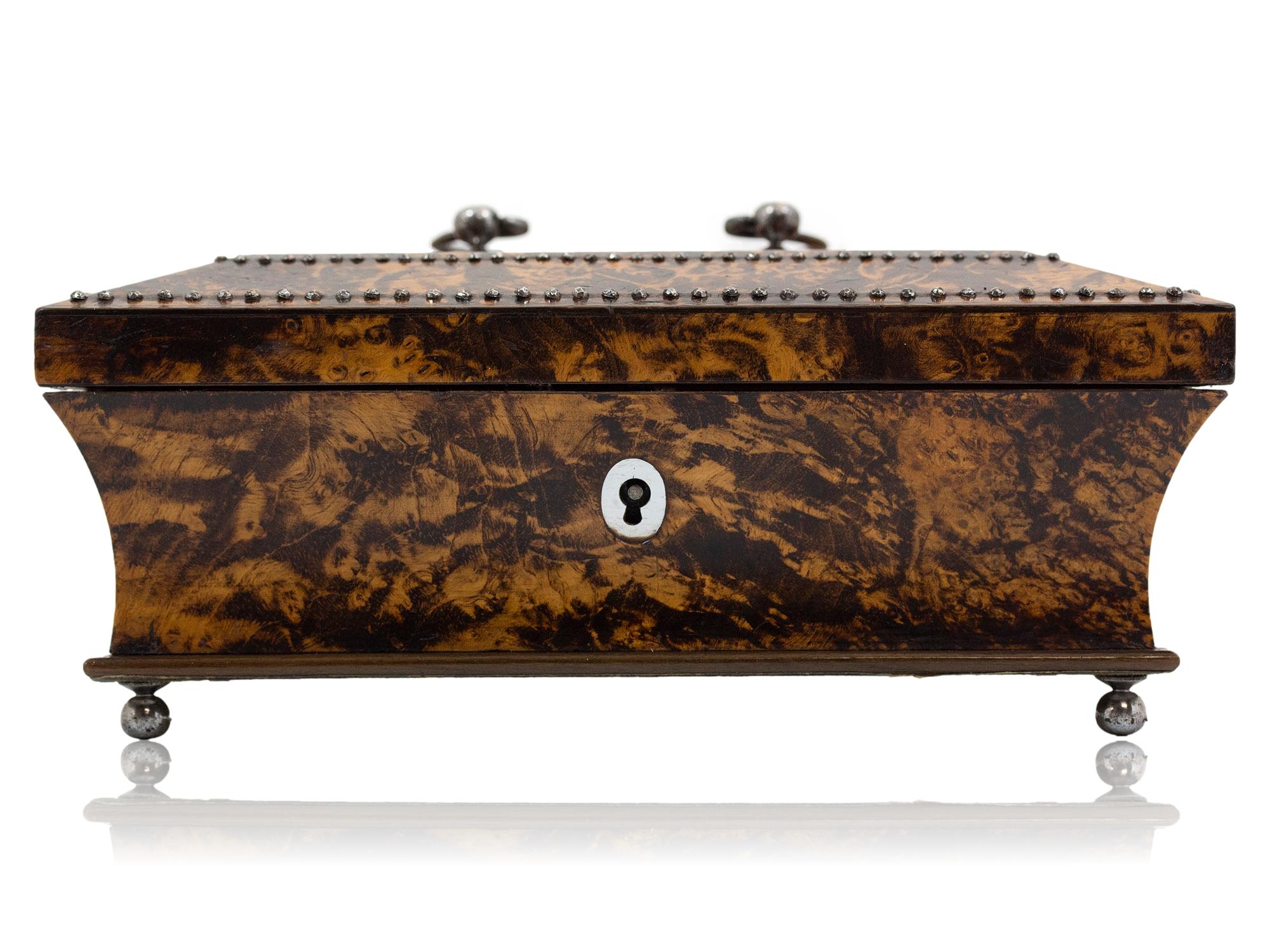 Louis XVIII (1814-1824)

From our Sewing Box collection, we are delighted to introduce to the market this superb Palais Royal Mulberry Sewing Box. The Sewing Box of sarcophagus shape beautifully veneered in Mulberry wood with cut steel faceted stud