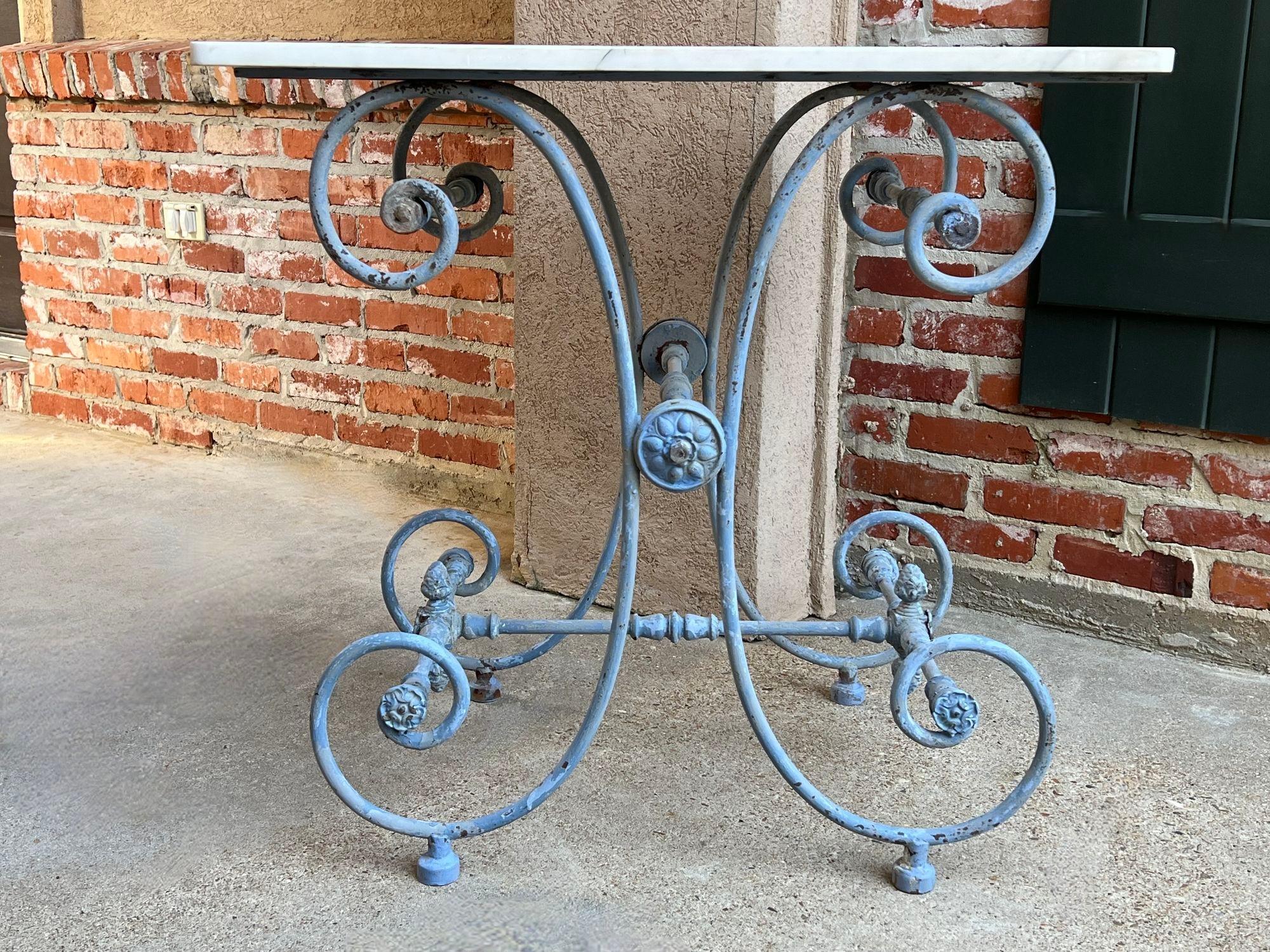 Antique French Pastry Baker’s Table Blue Iron White Marble Small Kitchen Island.

Direct from France, a fabulous (and highly sought after) antique French Pastry or “Patisserie” table!!! The elaborate, heavy scrolling iron base has a classic French