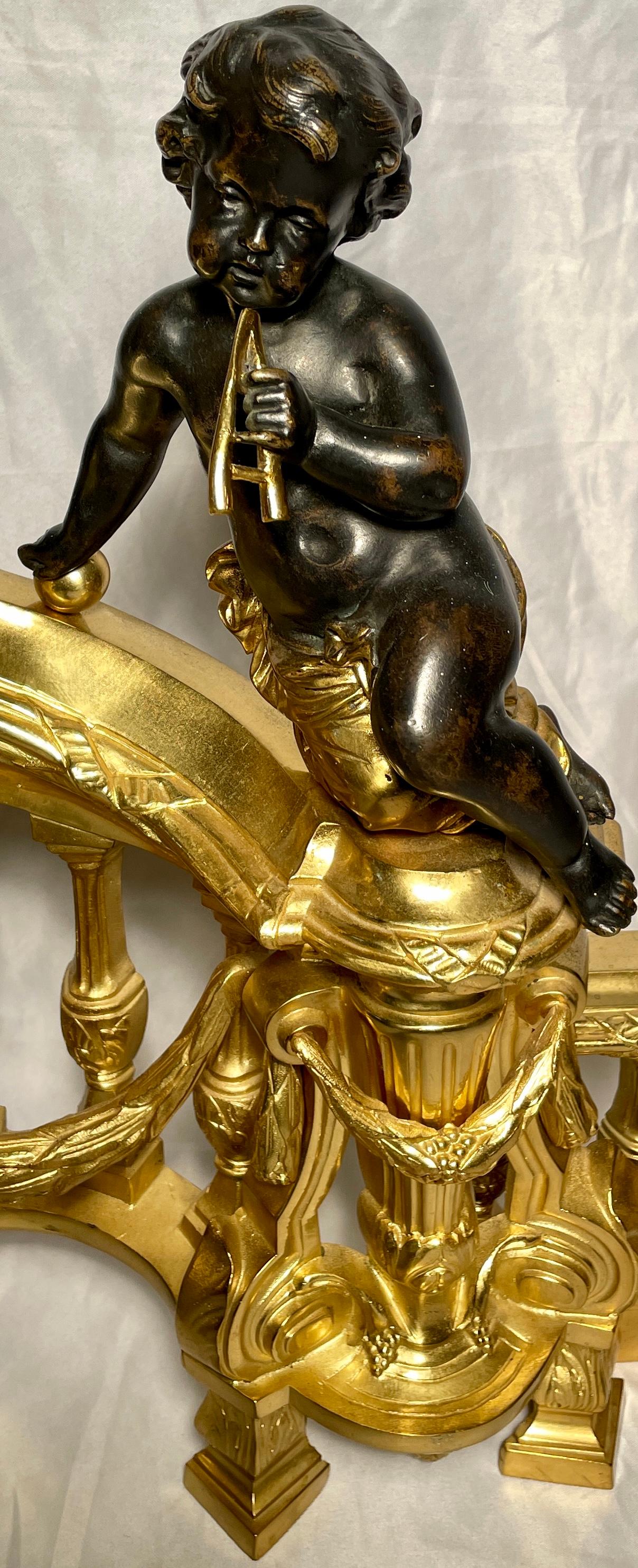 Antique French Patinated & Gold Bronze Cherub Chenets or Andirons, Circa 1870 In Good Condition For Sale In New Orleans, LA