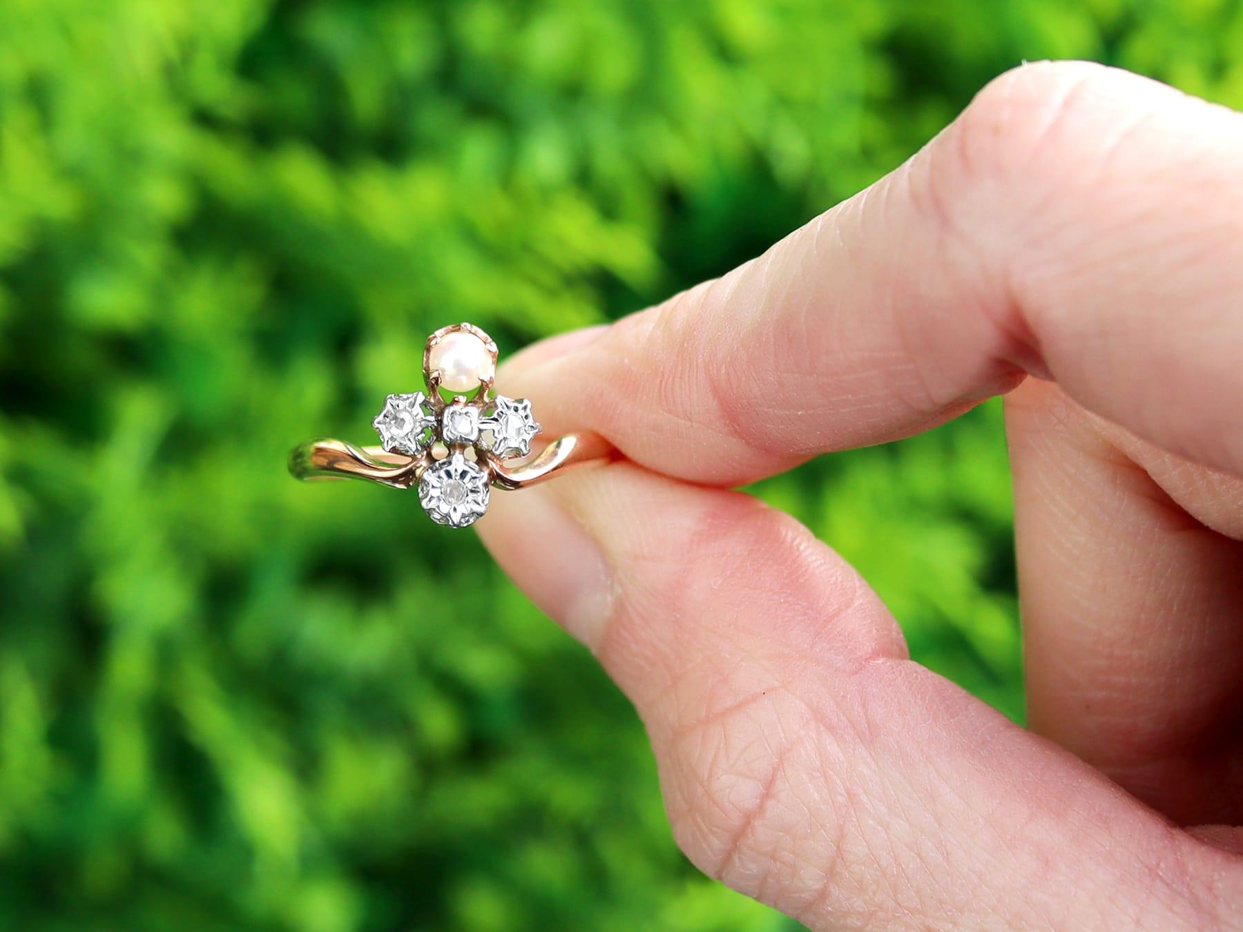 A fine and impressive antique French seed pearl and 0.09 carat diamond, 18 karat rose gold and 18 karat white gold set cocktail ring; part of our diverse antique jewelry and estate jewelry collections.

This fine and impressive pearl and diamond