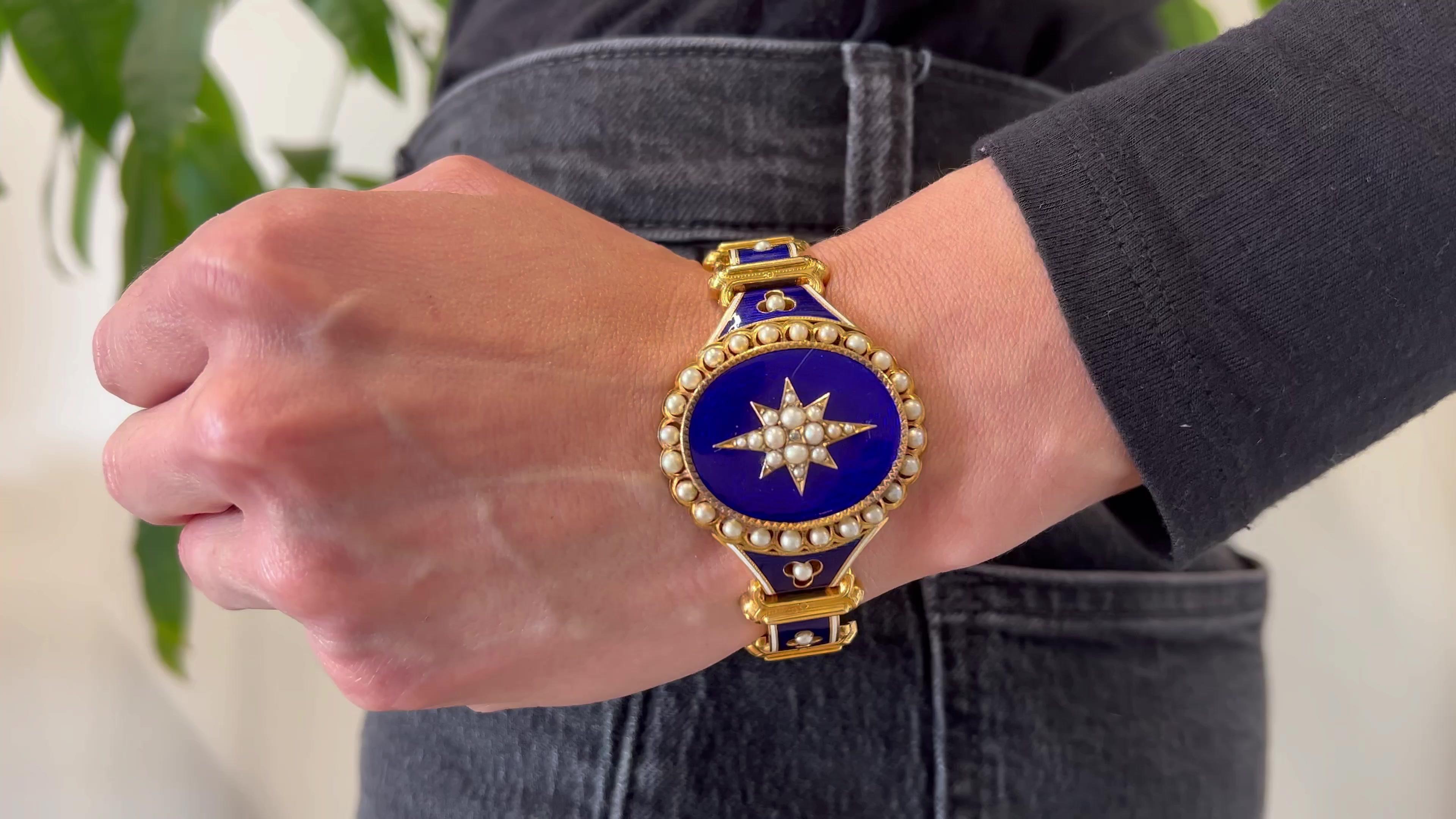 One Antique French Pearl Cobalt Blue Guilloche 18k Yellow Gold Link Bracelet. Featuring one senaille cut diamond. Accented by 46 pearls. Crafted in 18 karat yellow gold with Cobalt blue enamel with French hallmarks. Bracelet straps are removable and