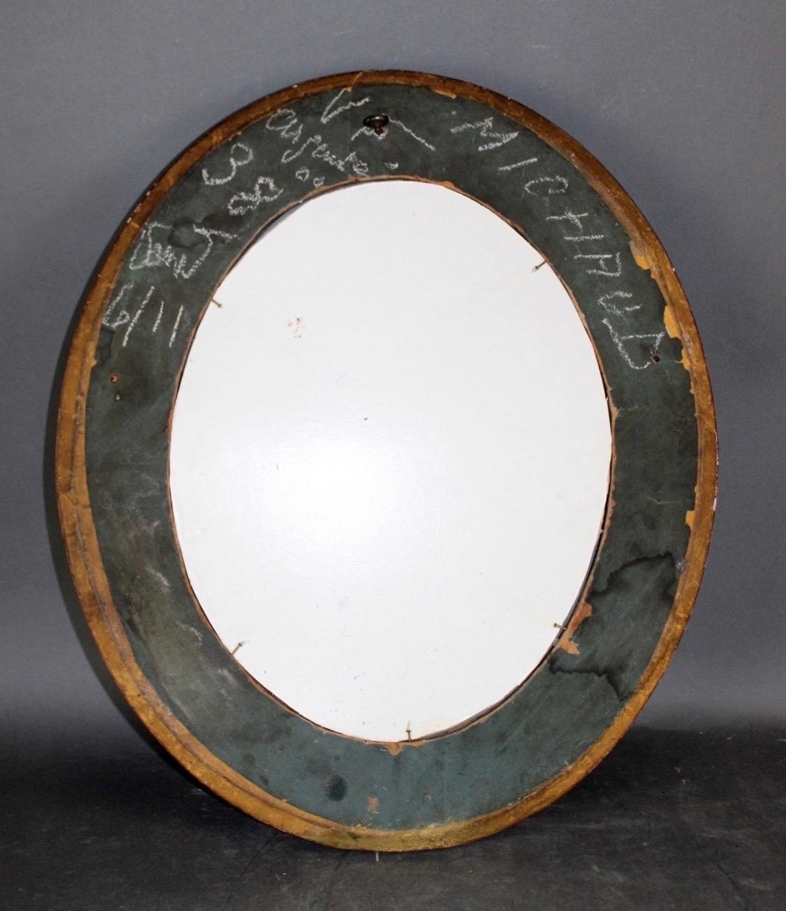 Hand-Carved Antique French Petite Giltwood Oval Mirror with Relief Carved Grape Vine Foliage