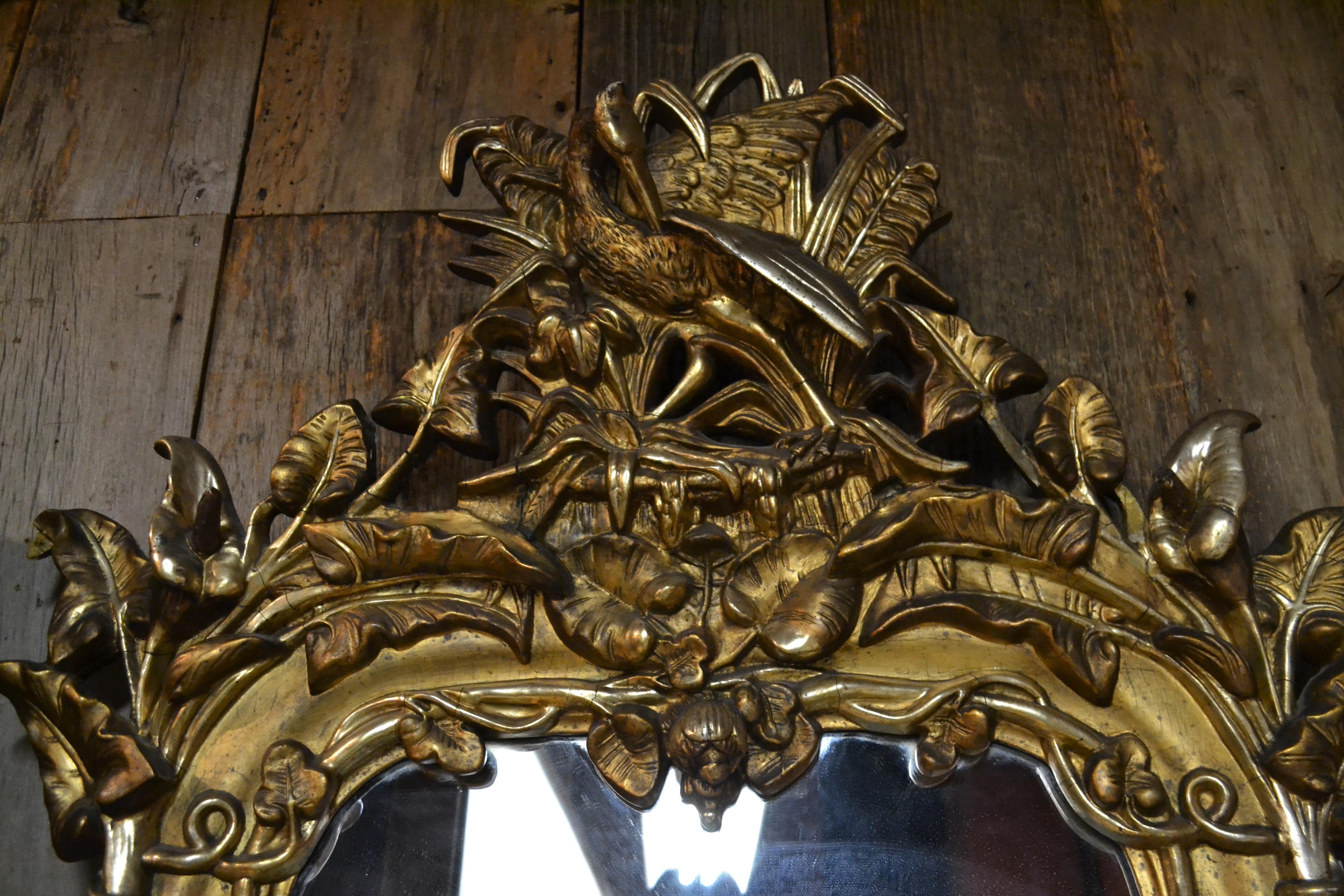 Wonderful gold leaf design. This handsome mirror came from an old River Road home in the New Orleans area.