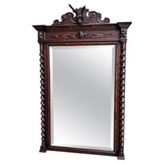 Ancien miroir de cheminée mural français en bois de la Forêt-Noire sculpté en forme de cerf torsadé