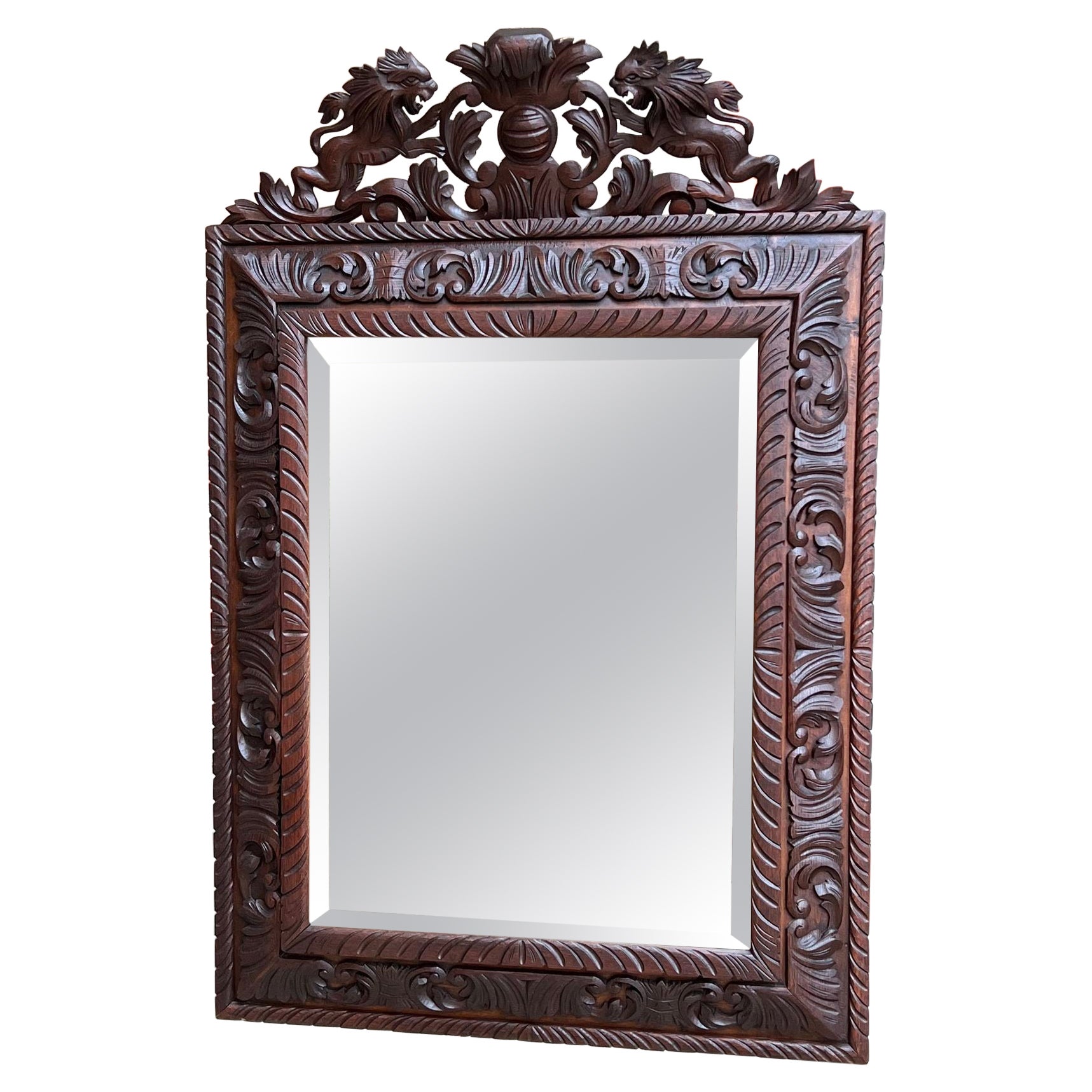 Antique French Pier Wall Mirror Rinascimento Black Forest Lion Crest intagliato Oak