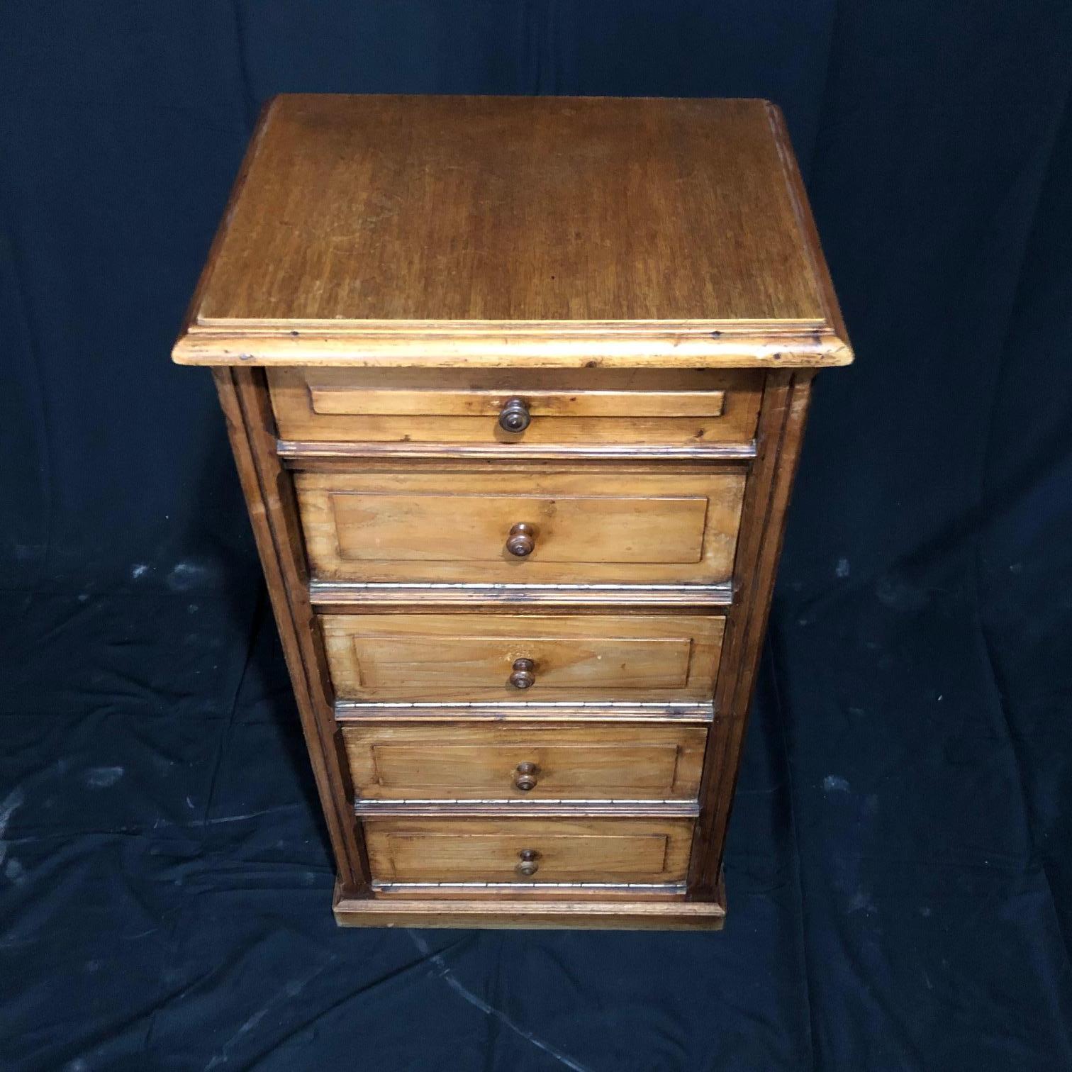 An innovative French storage cabinet or chest from Normandy, France having lovely lines, a single drawer on top and four surprising pull open storage compartments underneath.
 #5197.