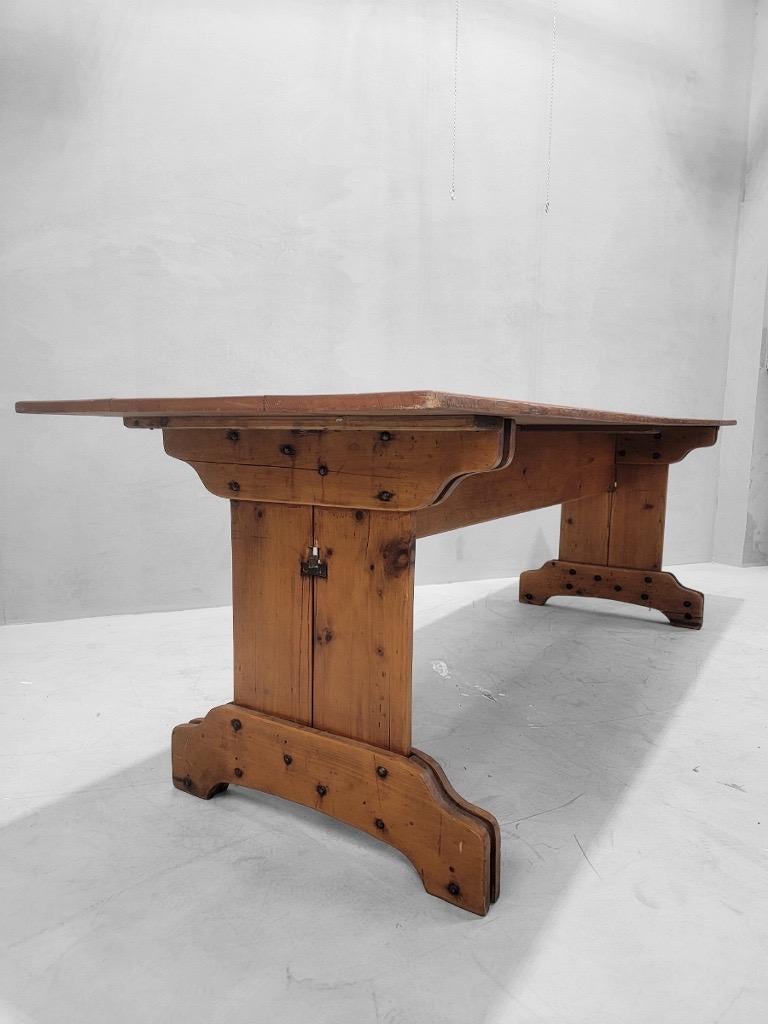Antique French Pine Plank Trestle Farm Table

This 8 ft table is perfect for casual dining or perhaps in a covered outdoor space for entertaining. It will easily seat up to 10 people. This table top has blunted corners, curved legs and a straight